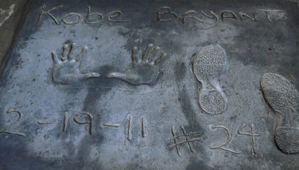 Kobe Bryant's Hand and Footprints Enshrined at TCL Chinese Theatre in Hollywood: A Commemoration of the Basketball Legend.