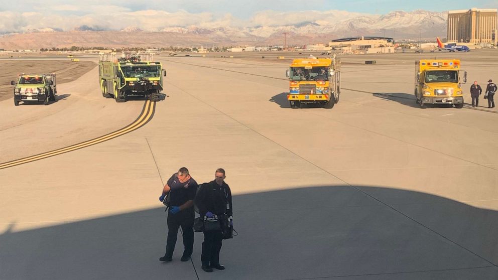 Off-duty pilot assists in landing plane after pilot experiences medical emergency during flight