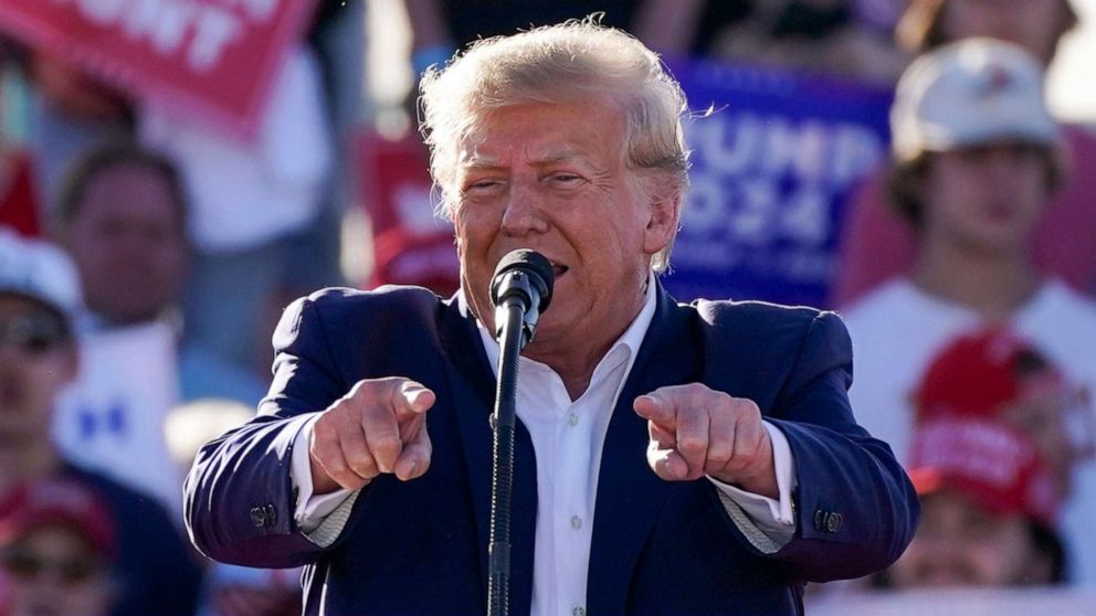 Trump criticizes potential 2024 opponents and addresses potential indictment at campaign rally.