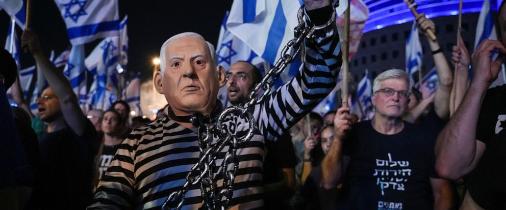 Israeli citizens protest government's proposal to reform judiciary through a march