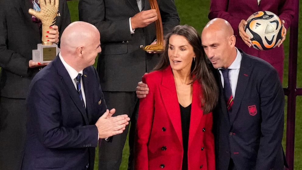 Controversy arises as Spanish soccer leader kisses Women’s World Cup star on the mouth without consent, sparking anger.
