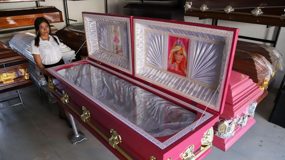 El Salvador Funeral Home Presents Pink Coffins with Barbie Linings