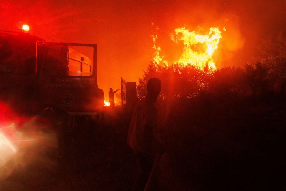 Wildfires in Greece claim 18 lives as bodies discovered in forest