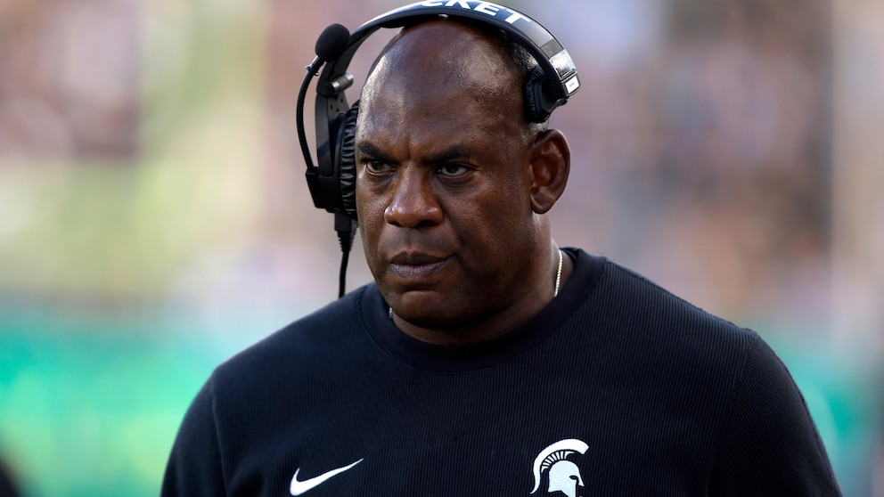 Michigan State takes action by suspending coach Mel Tucker following allegations of sexual harassment towards a rape survivor