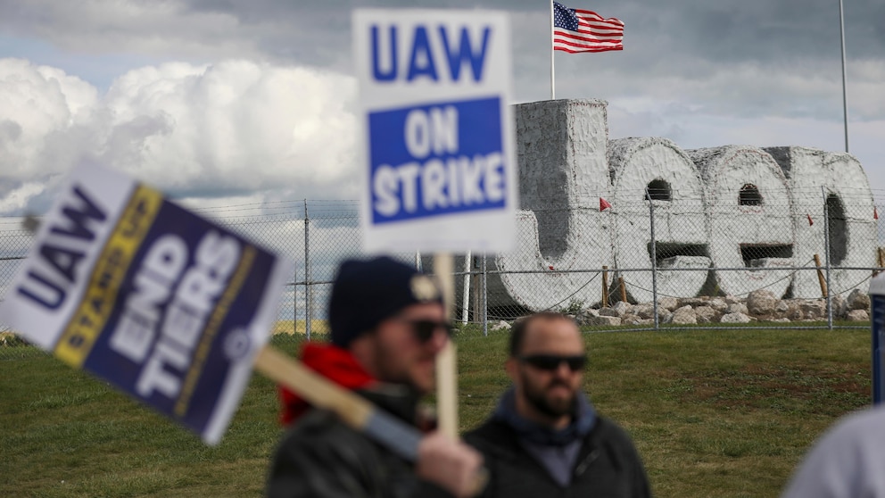 Workers at the largest Ford factory stage an escalated strike, walking out