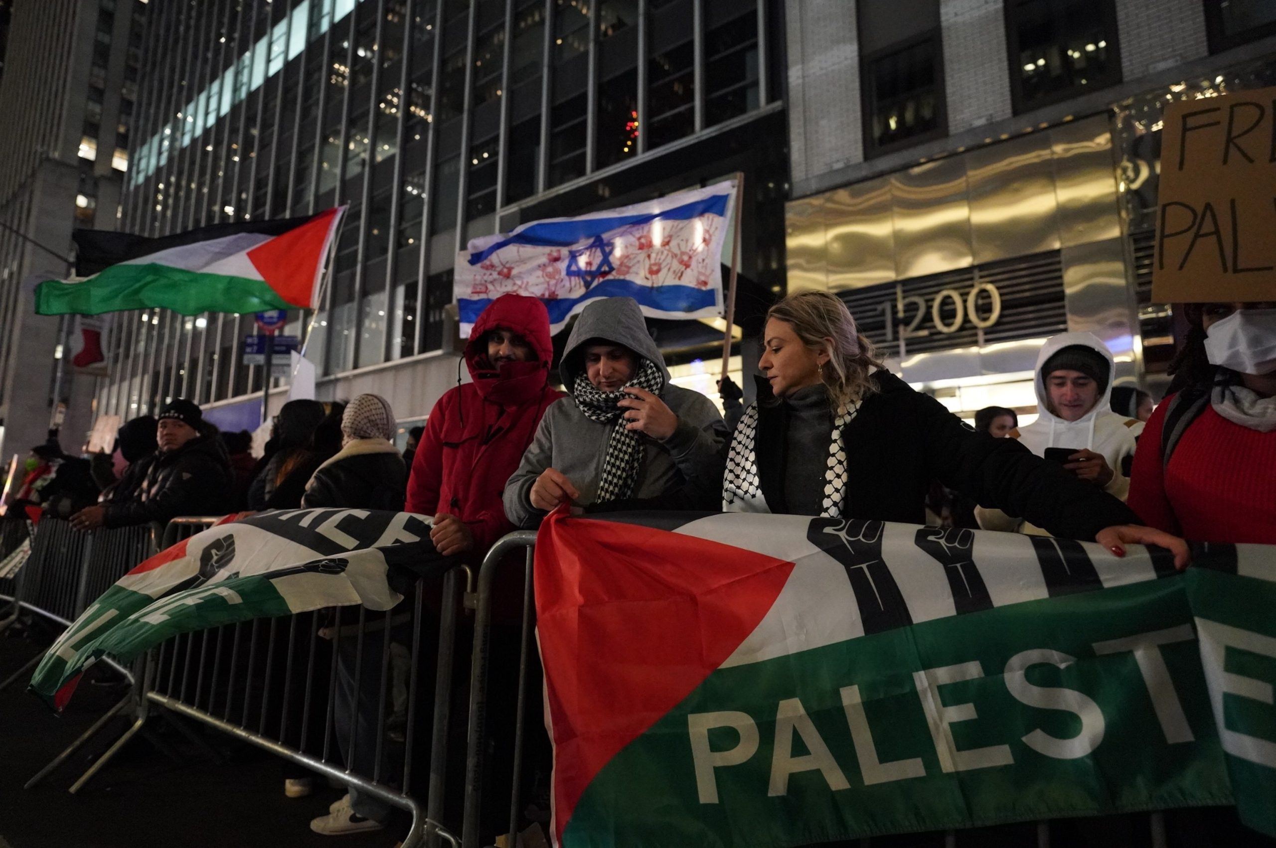 Multiple individuals detained during a pro-Palestinian protest near Rockefeller Center tree lighting event