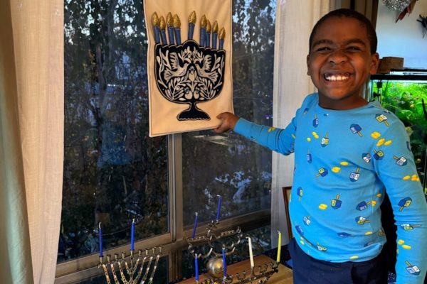 How to Support Jewish Allies: Video Dad Urges Displaying Menorah Amidst Growing Antisemitism