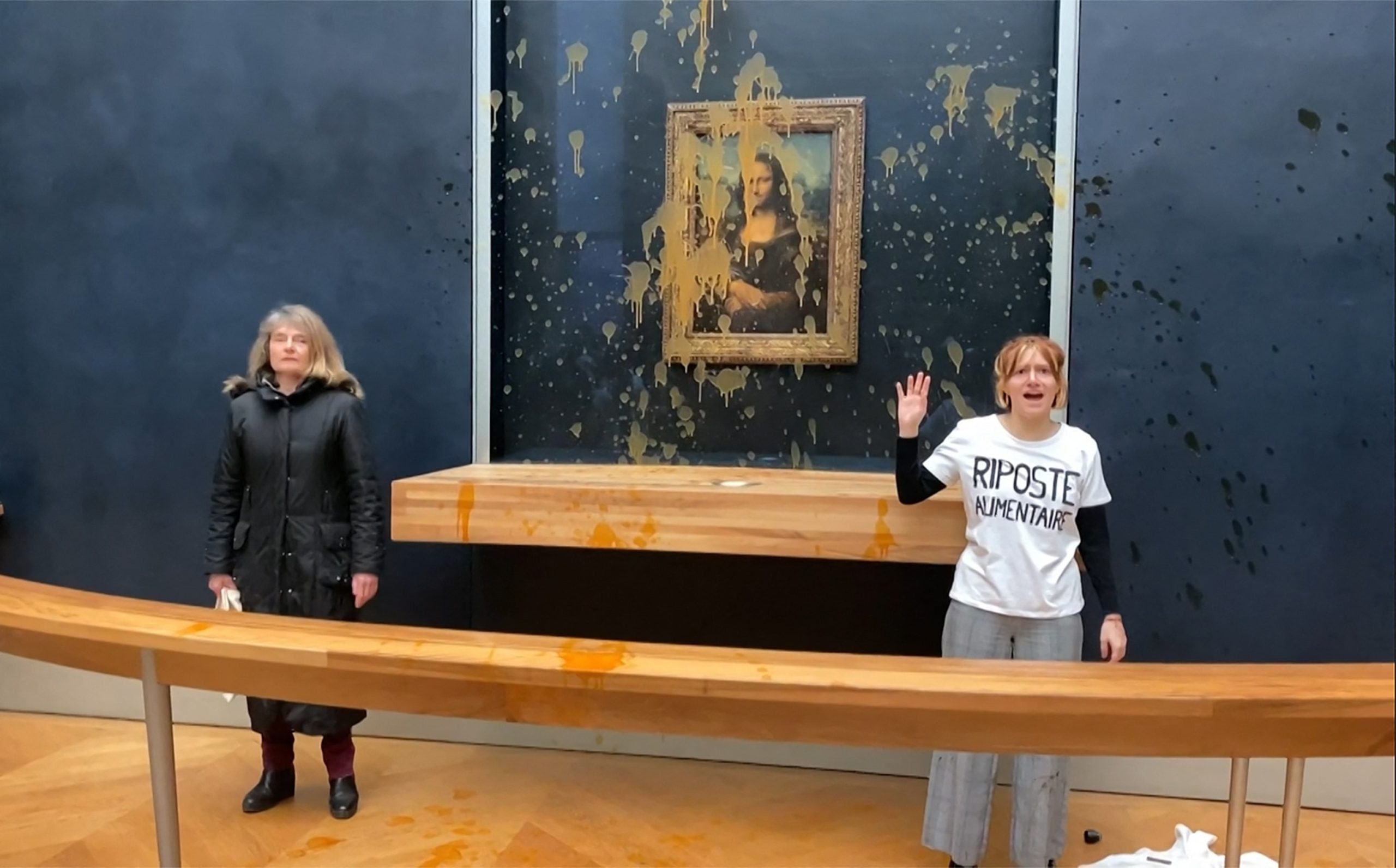 Activists vandalize 'Mona Lisa' with soup at Louvre Museum in Paris