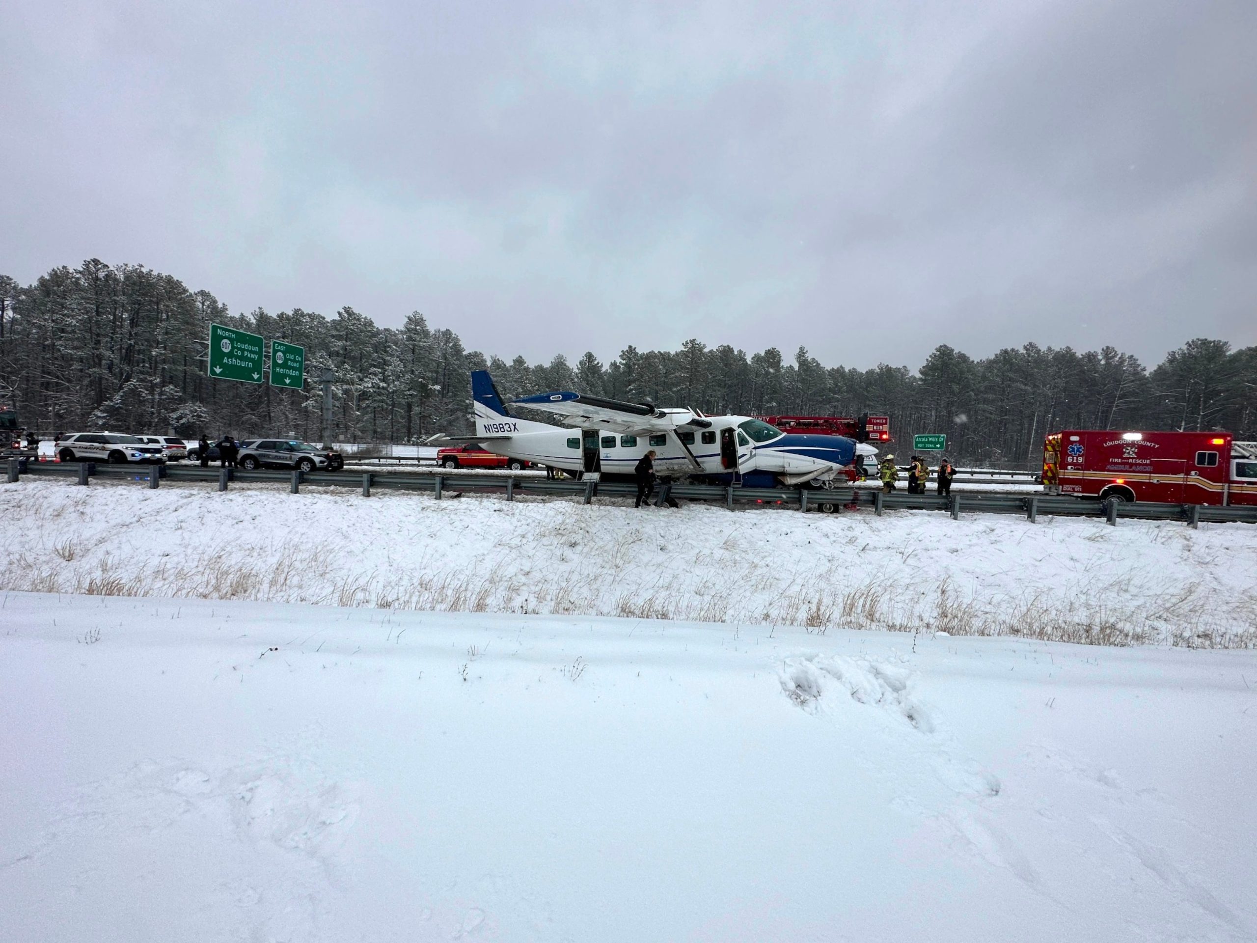 Small aircraft carrying 7 individuals experiences a challenging landing on Virginia highway