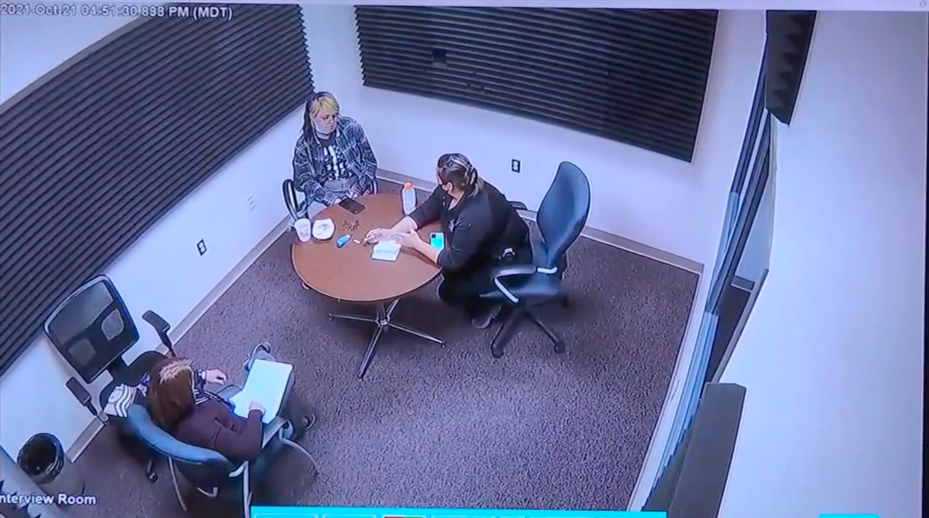 PHOTO: In a video showing during her trial on Feb. 27. 2024, Hannah Gutierrez (in the blue mask) is seen being interviewed at the Santa Fe County Sheriff's Office on Oct. 21, 2021.