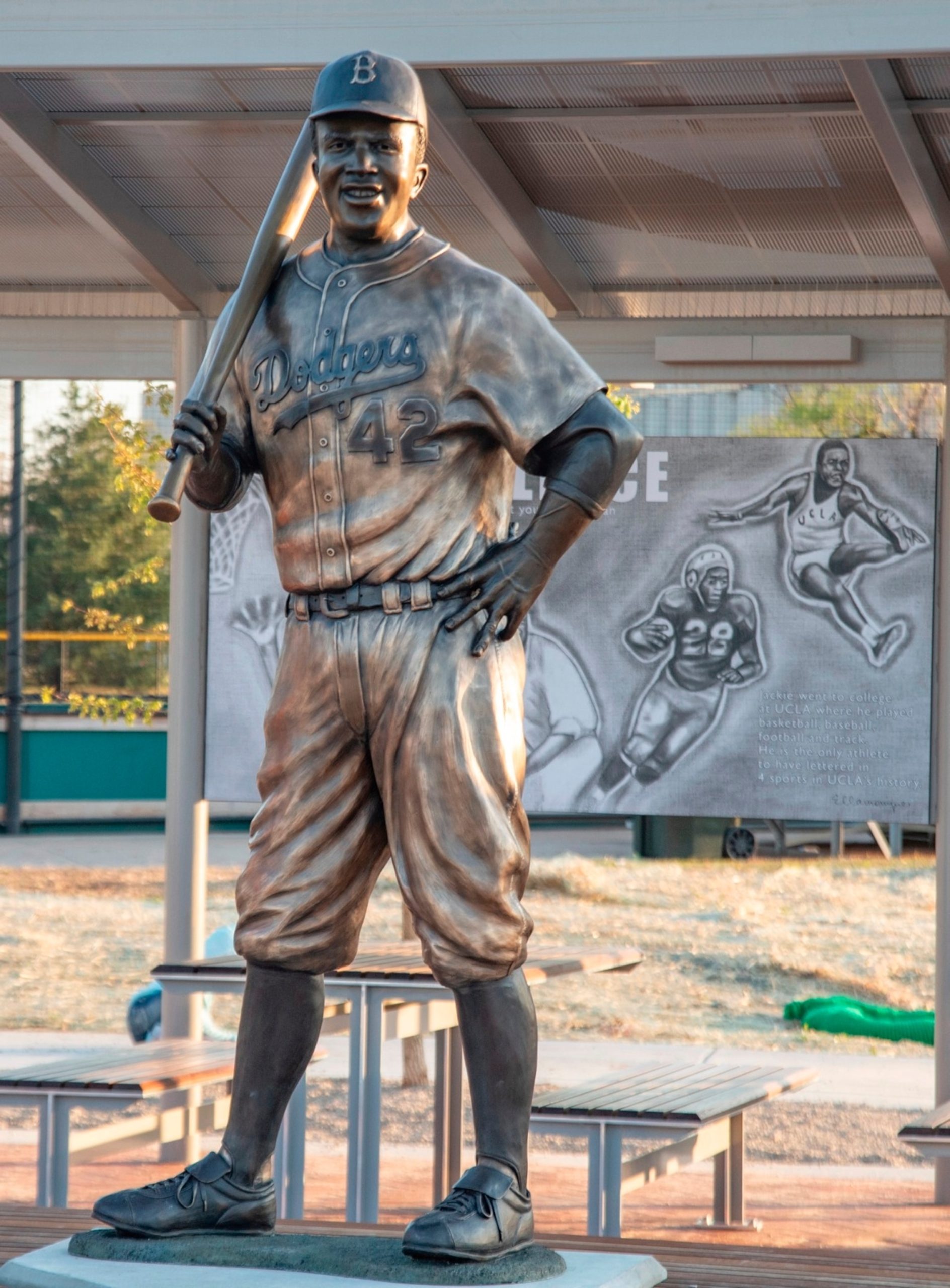 Man charged in theft of destroyed Jackie Robinson statue, authorities still searching for other suspects