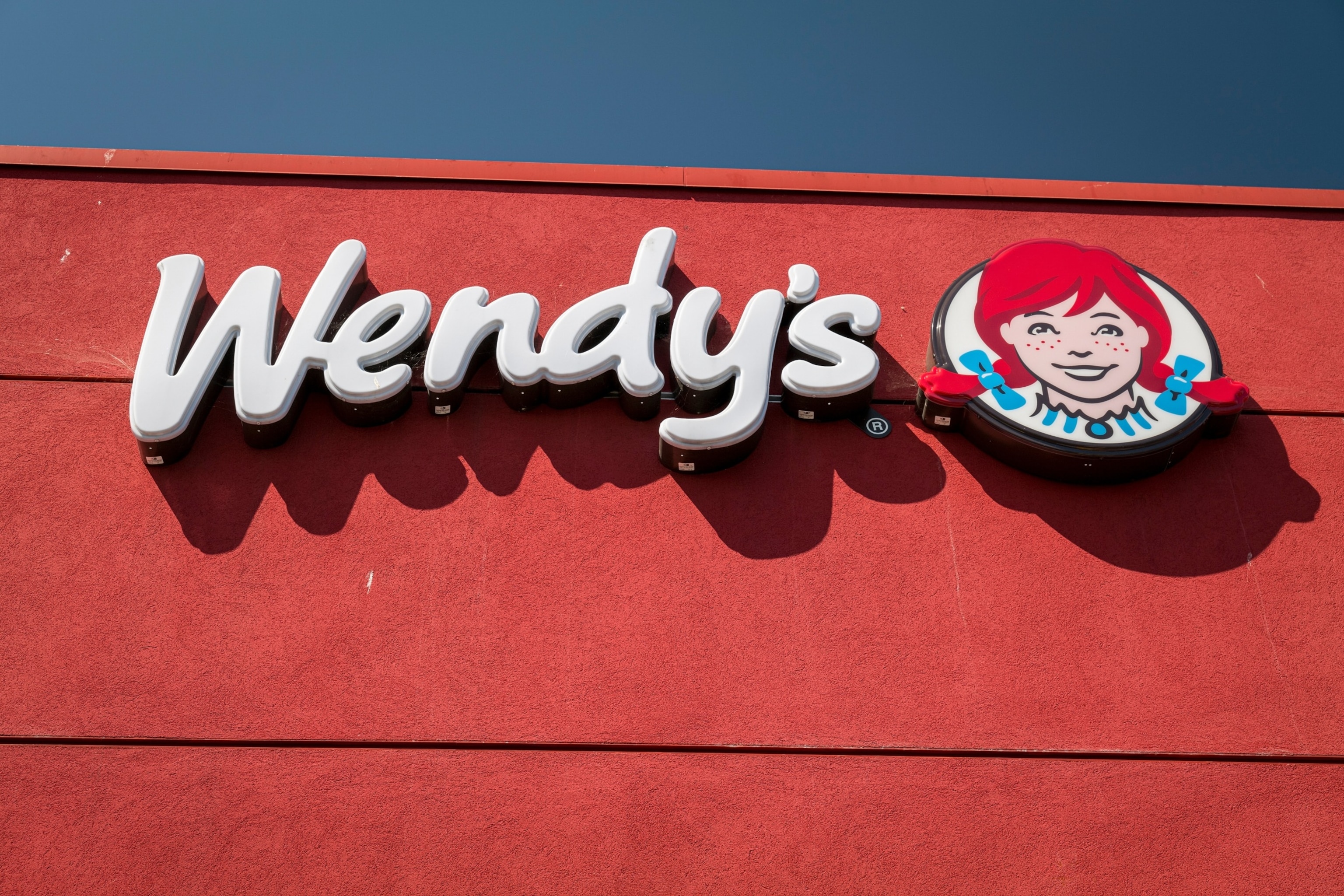 PHOTO: Signage is displayed outside a Wendys Co. restaurant in El Sobrante, Calif., May 6, 2020.  