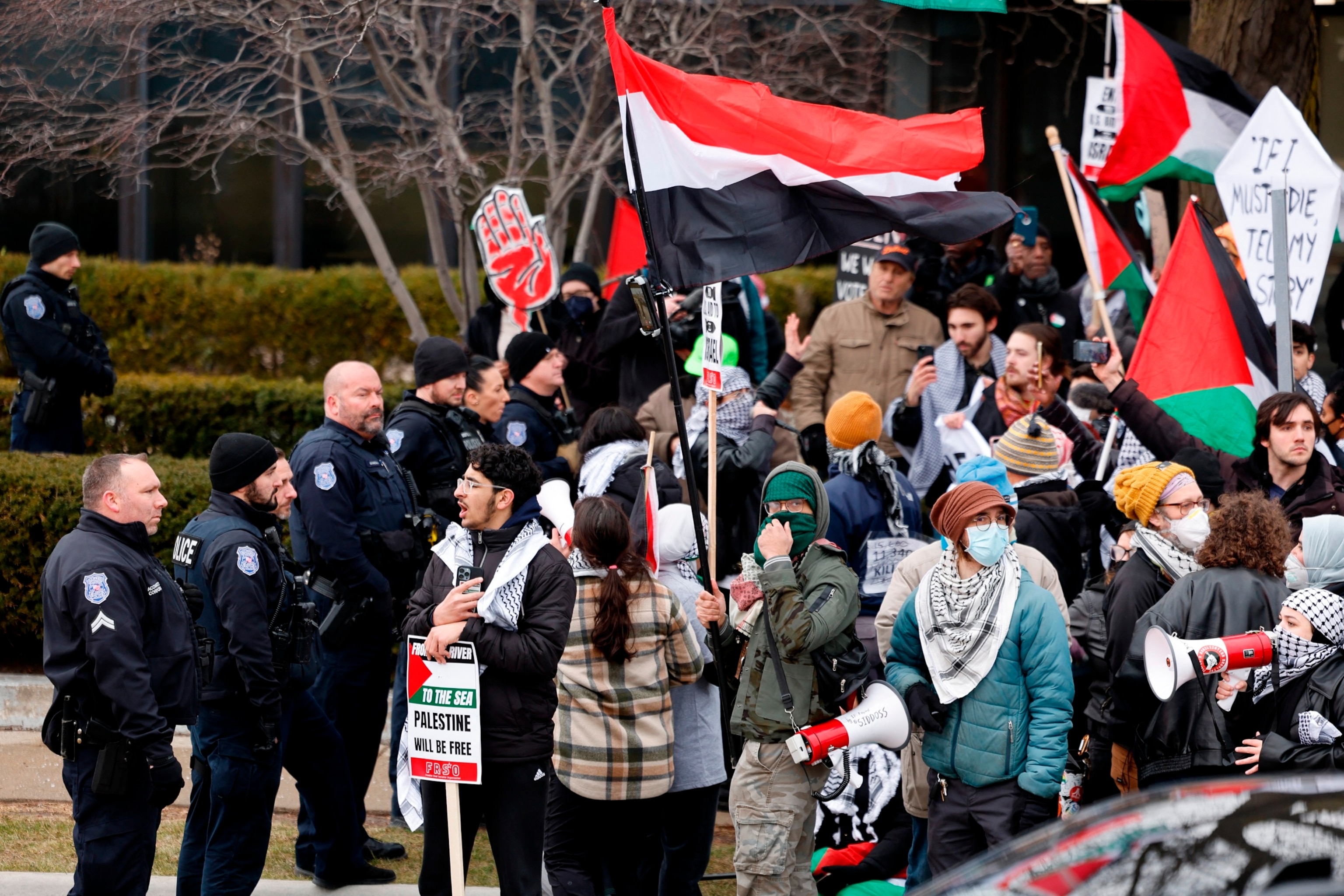 PHOTO: People gather in support of Palestinians outside of the venue where President Joe Biden is speaking to members of the United Auto Workers, in Warren, Michigan, Feb. 1, 2024. 