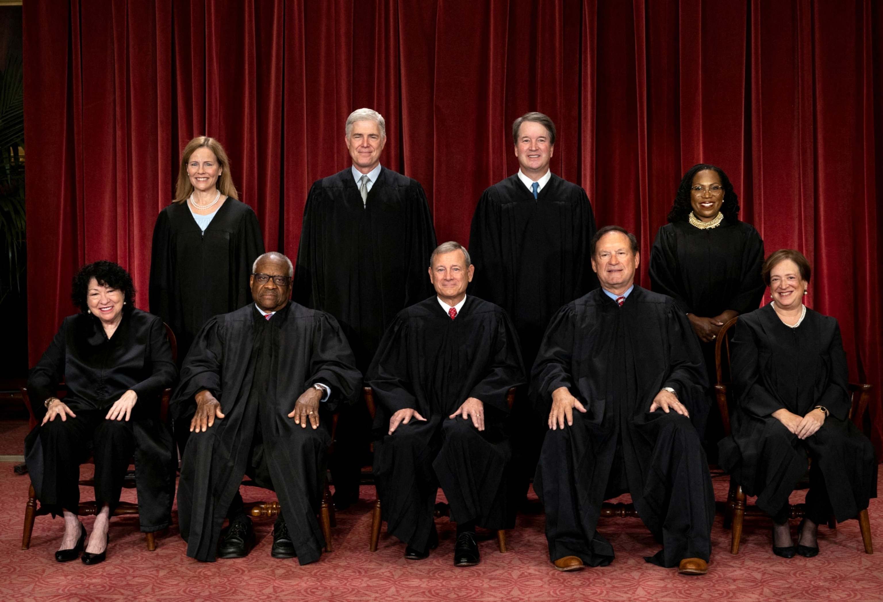PHOTO: U.S. Supreme Court justices pose for their group portrait at the Supreme Court in Washington