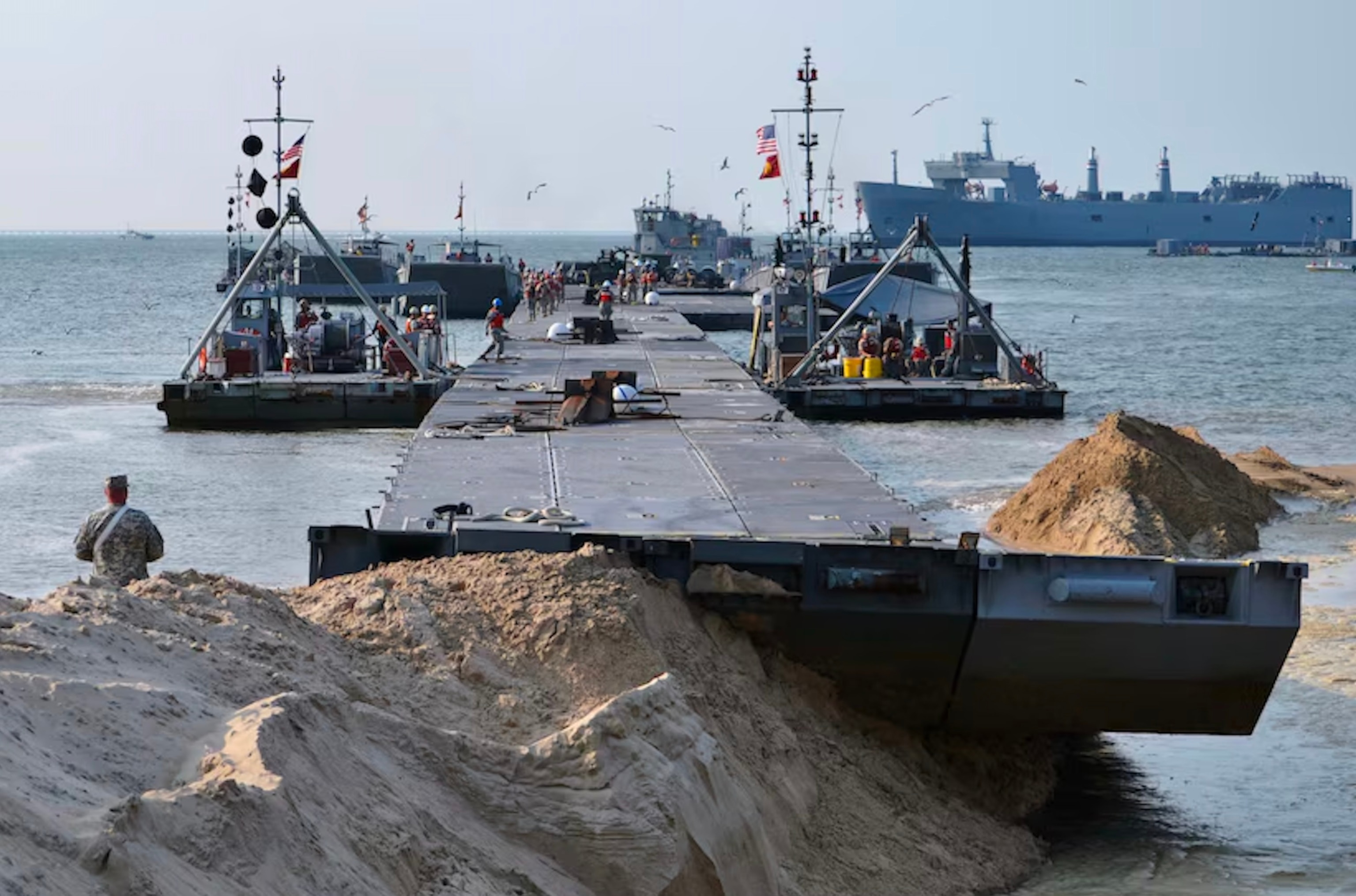 PHOTO: The Trident pier rests on the shore of Fort Story, Va., during the preliminary stages of the Joint Logistics-Over-the-Shore exercise, Aug. 17, 2012.