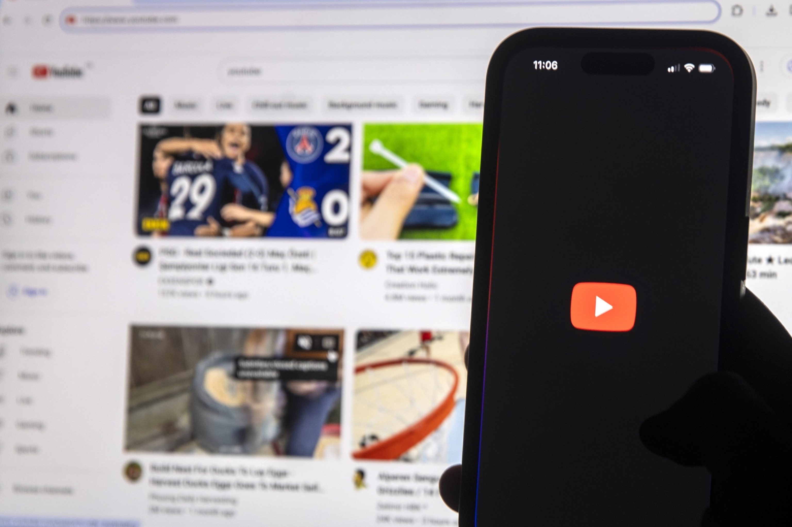 PHOTO: Youtube is displayed on mobile phone.
