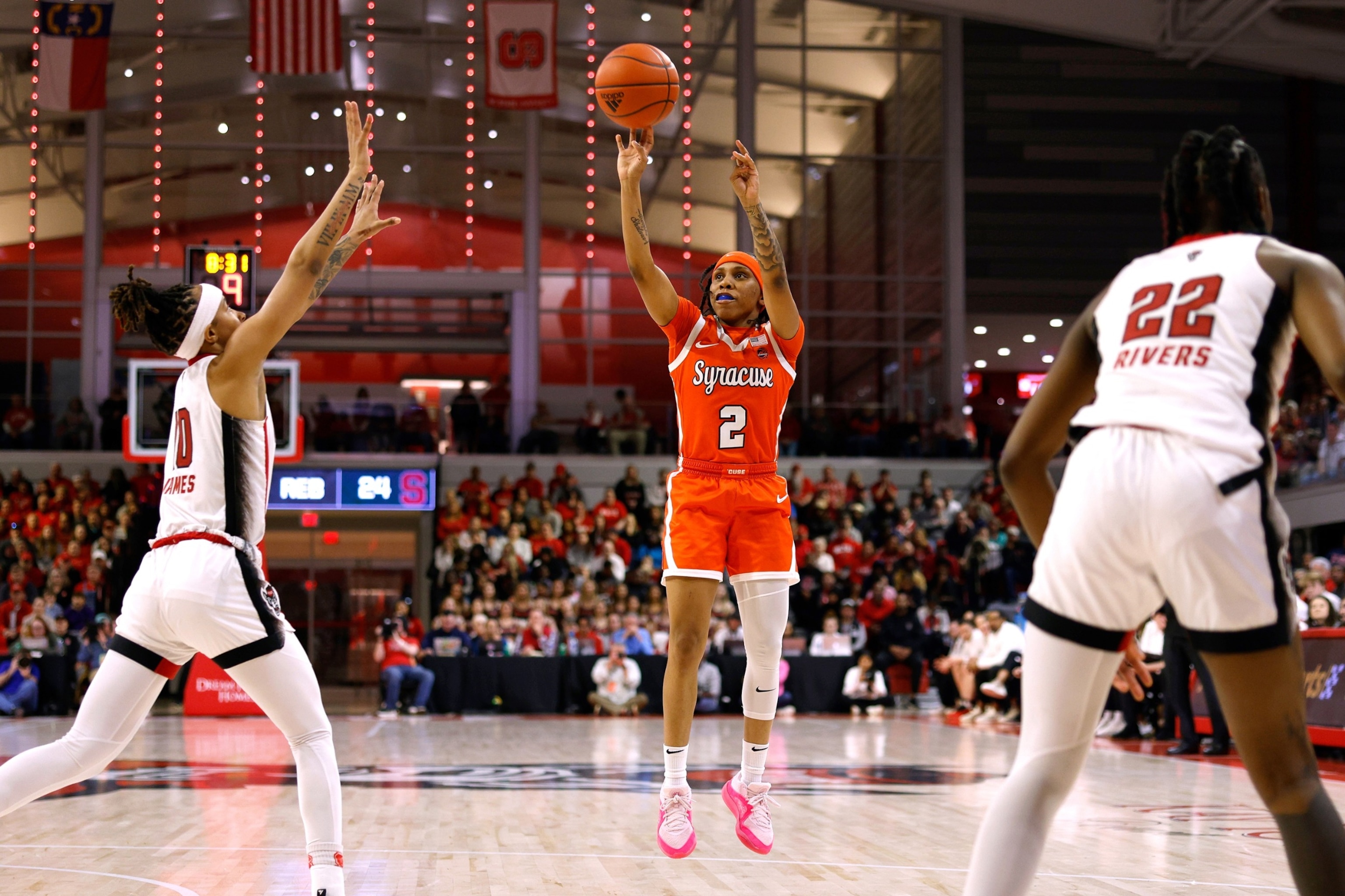 PHOTO: Dyaisha Fair of the Syracuse Orange puts up a shot during the second half of the game against the NC State Wolfpack at Reynolds Coliseum, on Feb. 29, 2024, in Raleigh, North Carolina. 