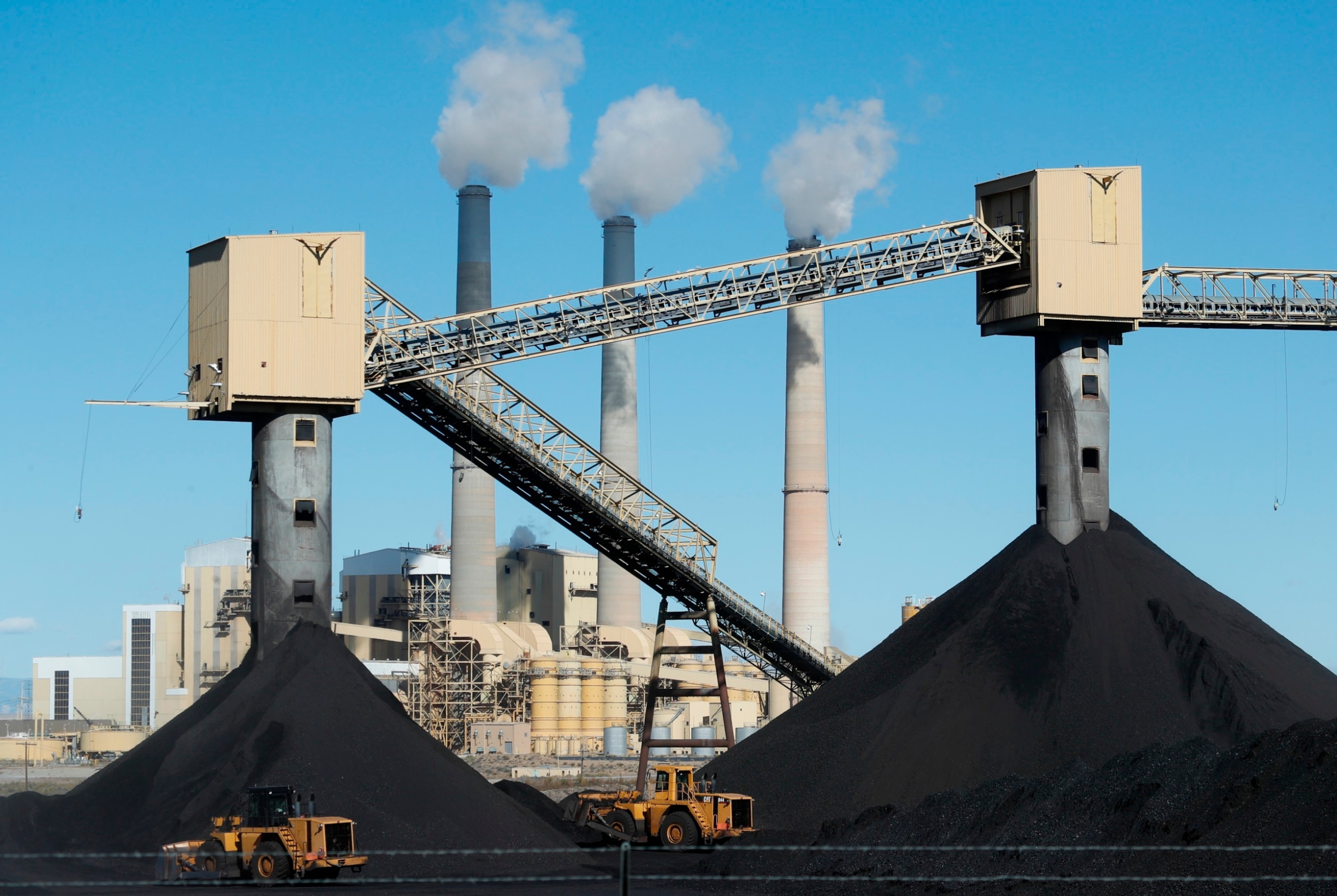 PHOTO: Piles of coal sit in front of Pacificorp's coal-fired power plant in Castle Dale, UT, Oct. 9, 2017.