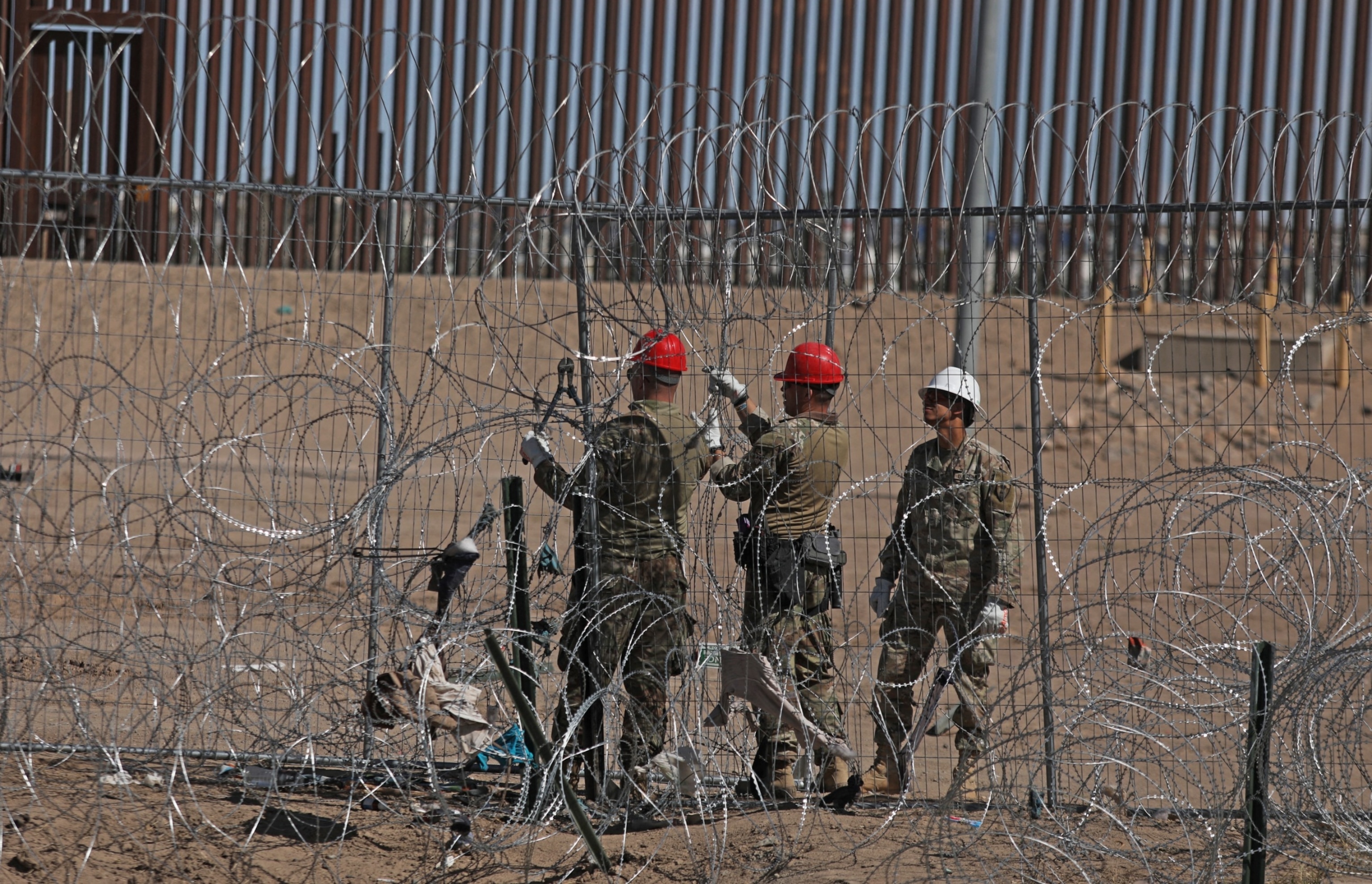 PHOTO: Engineers from the Texas National Guard erect a wire fence on the banks of the Rio Grande river to prevent the illegal entry of migrants from Ciudad Juarez, Chihuahua State, Mexico, March 4, 2024.