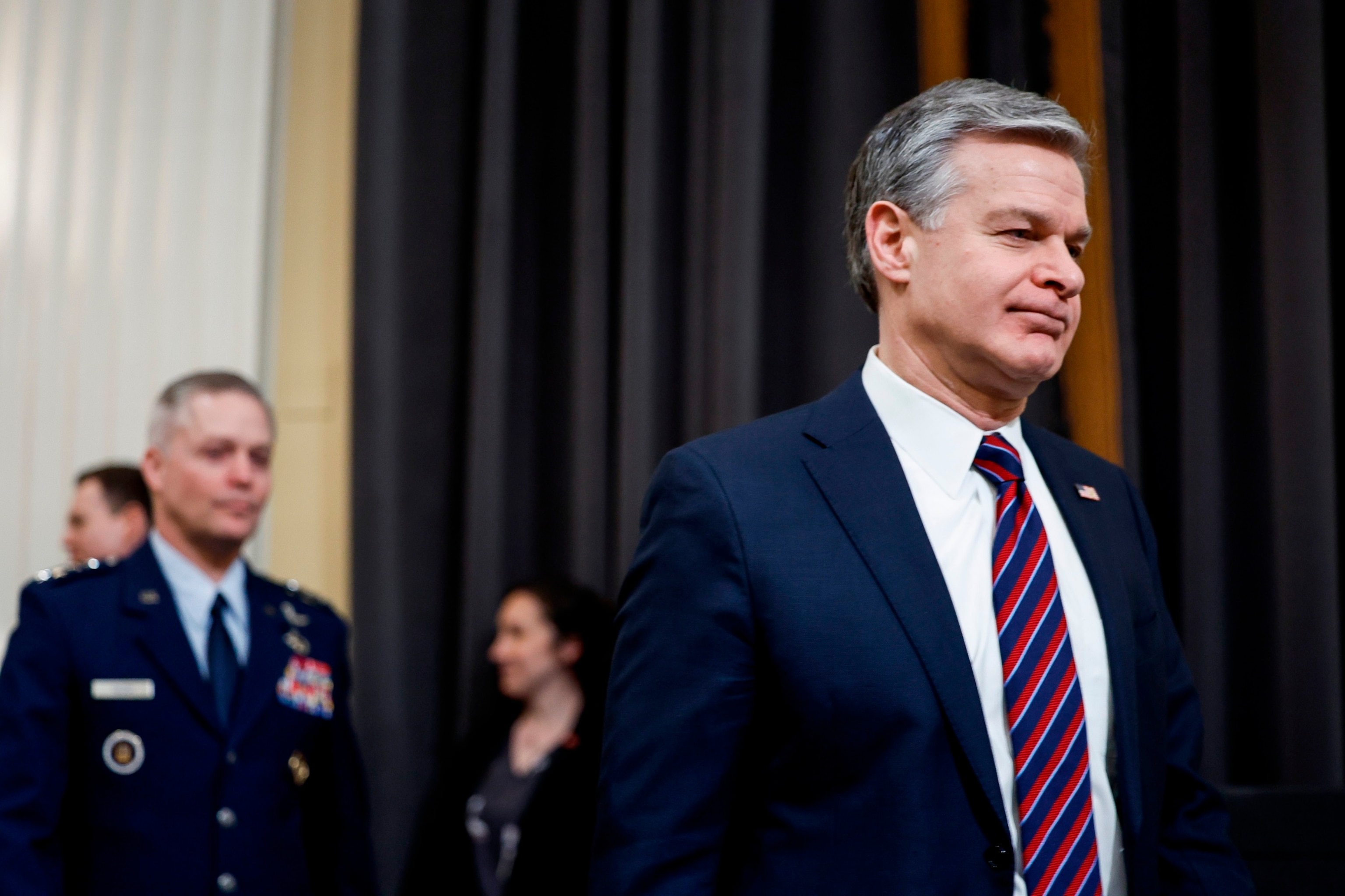 PHOTO:  Federal Bureau of Investigation Director Christopher Wray arrives at a hearing with the House (Select) Intelligence Committee in the Cannon Office Building on March 12, 2024 in Washington, DC.