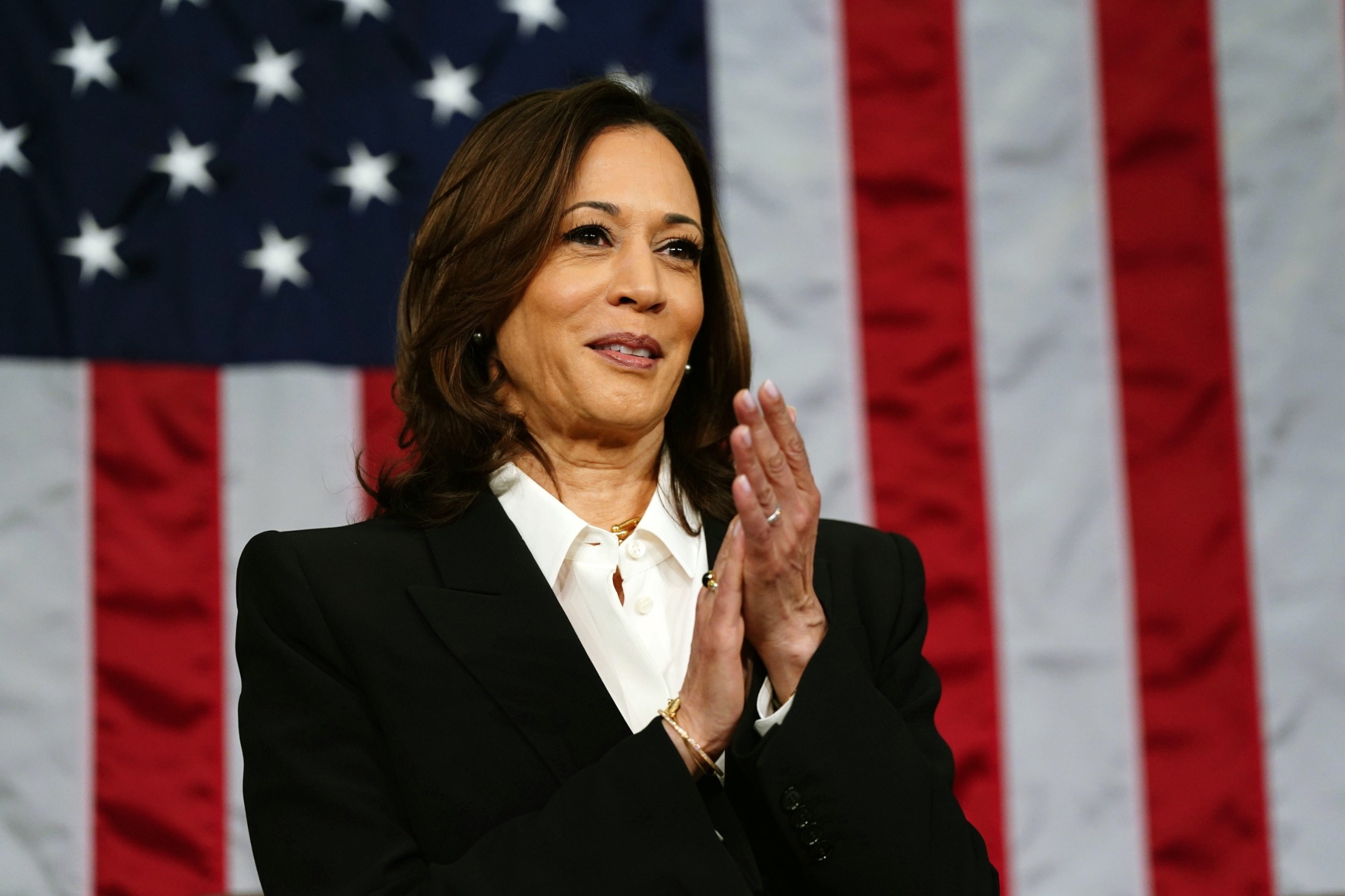 PHOTO: Vice President Kamala Harris stands in the House of Representatives ahead of President Joe Biden's third State of the Union address to a joint session of Congress in the US Capitol in Washington, DC on March 7, 2024.