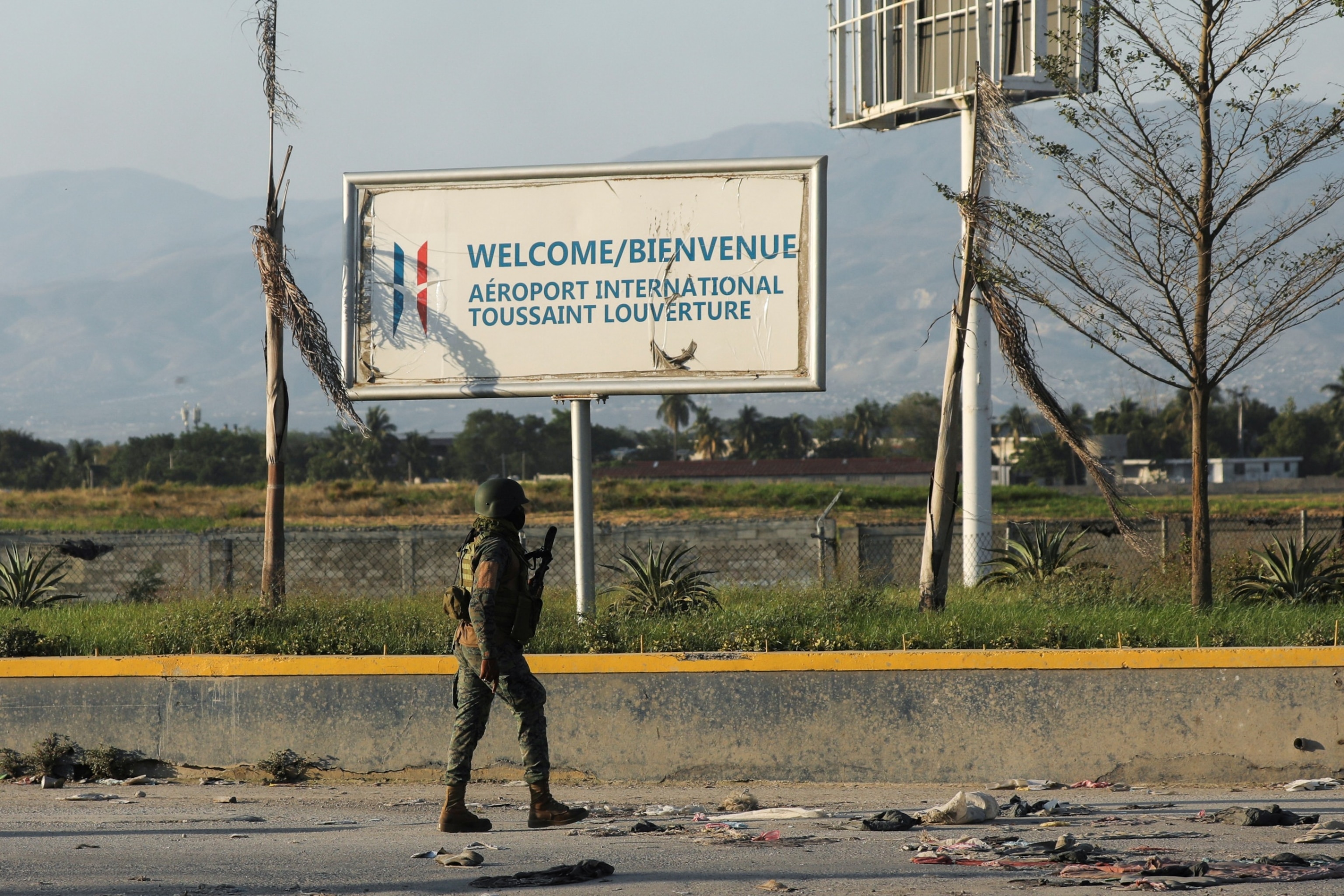 PHOTO: A Haitian soldier patrols outside the Toussaint Louverture International Airport following a gunfight with armed gangs in the surrounding area in Port-au-Prince, Haiti, on March 4, 2024.