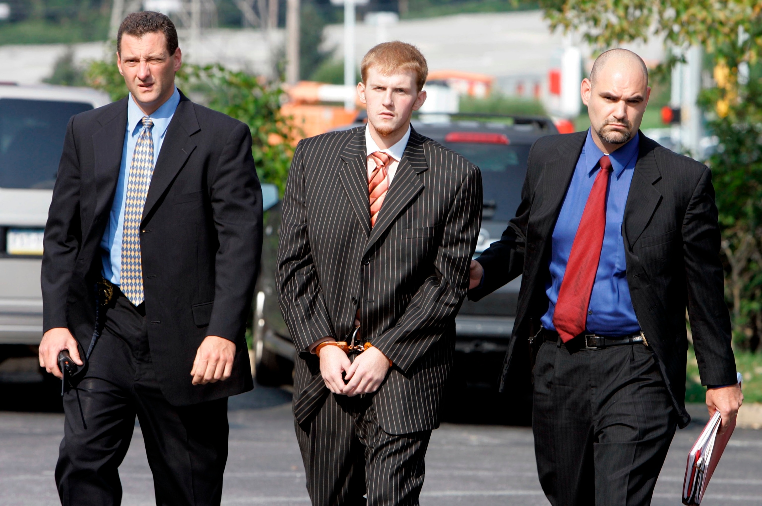 PHOTO: In this Aug. 29, 2007, file photo, former Kansas City Chiefs assistant coach Britt Reid is escorted into the Montgomery County district court house in Conshohocken, Pa. 
