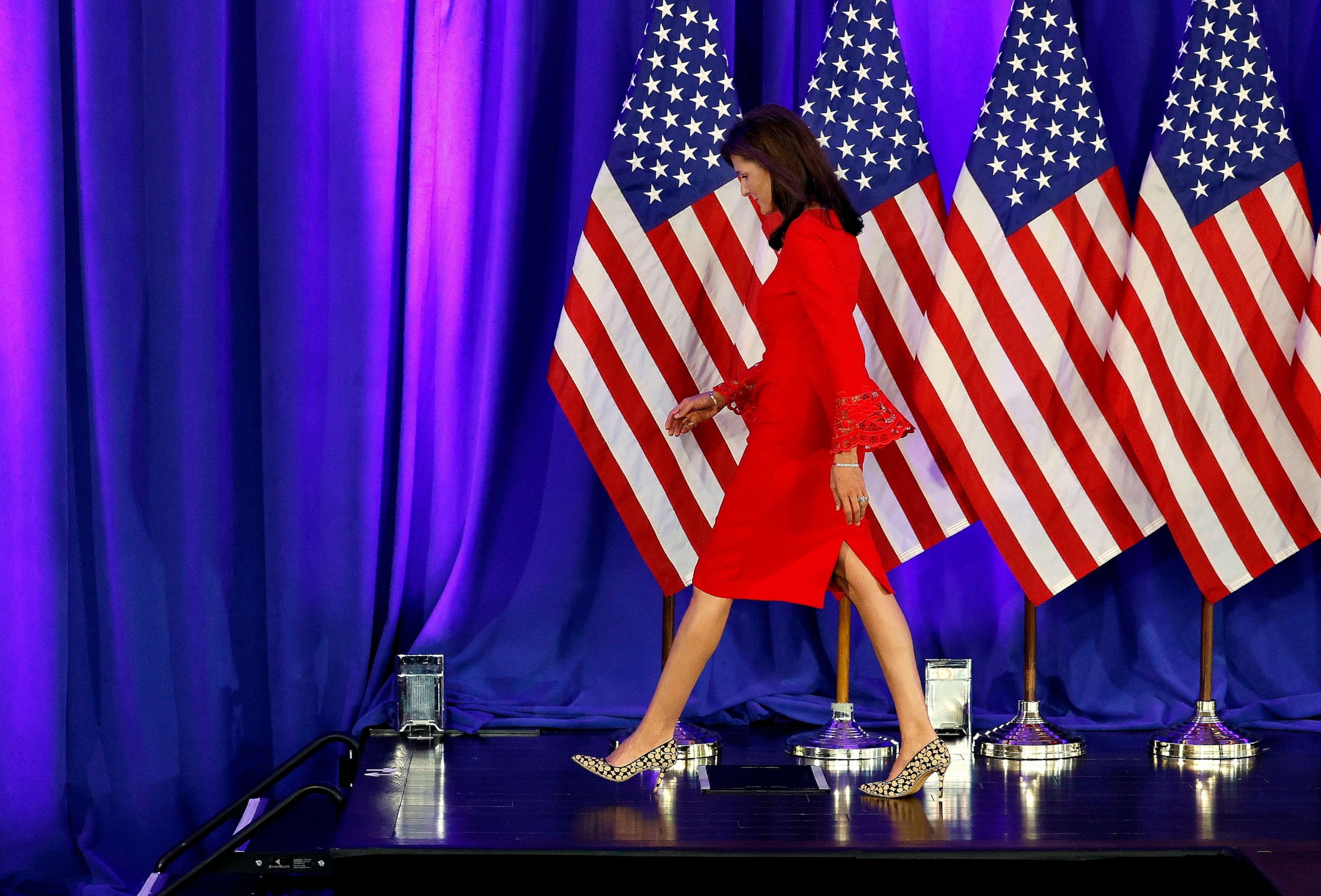 PHOTO: Republican presidential candidate and former U.N. Ambassador Nikki Haley walks off stage after announcing the suspension of her presidential campaign at her campaign headquarters, March 6, 2024, in Daniel Island, S.C.