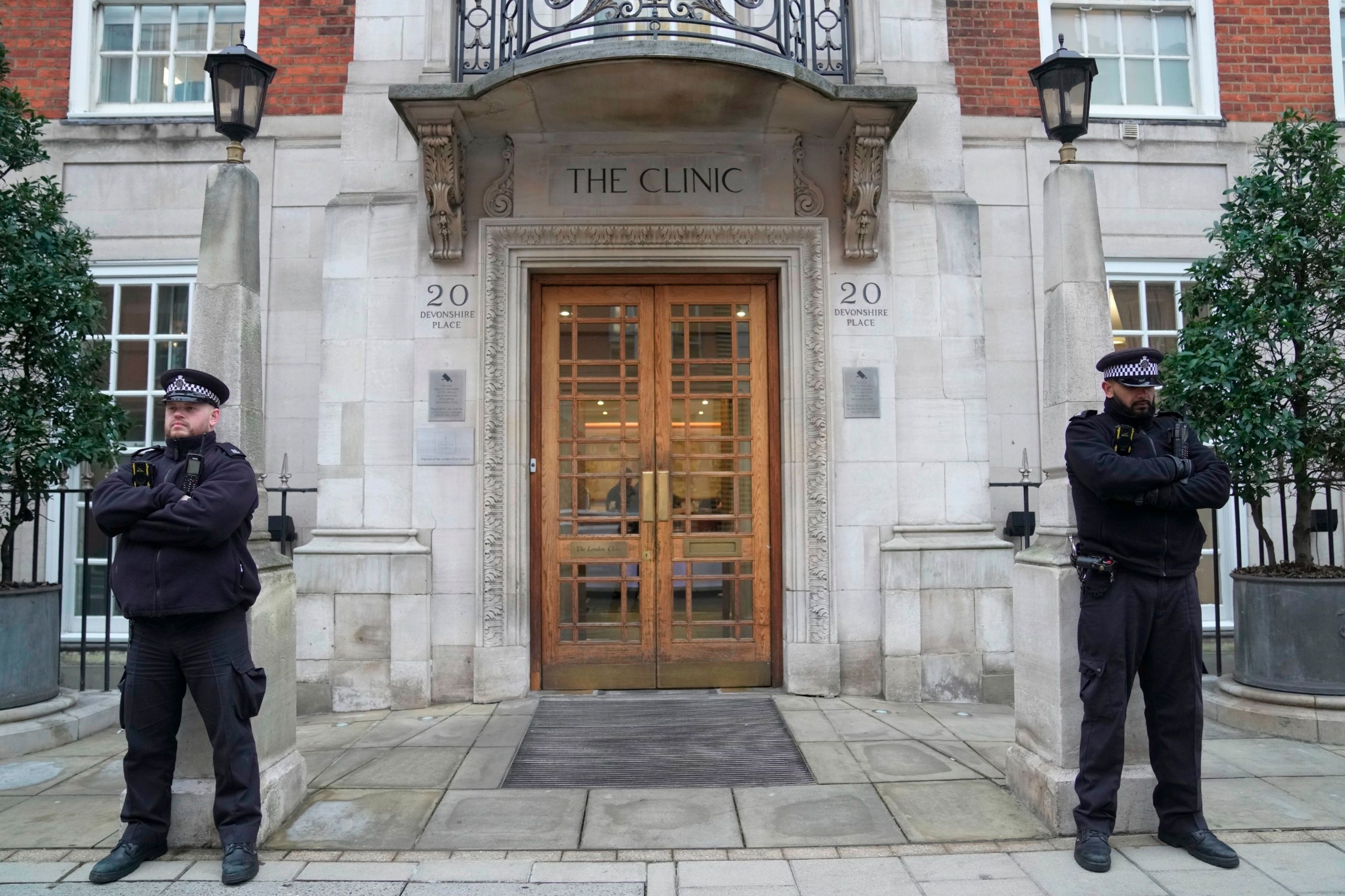 PHOTO: Police officers stand guard outside The London Clinic where Kate, Princess of Wales is recovering from surgery, in London, Jan. 17, 2024