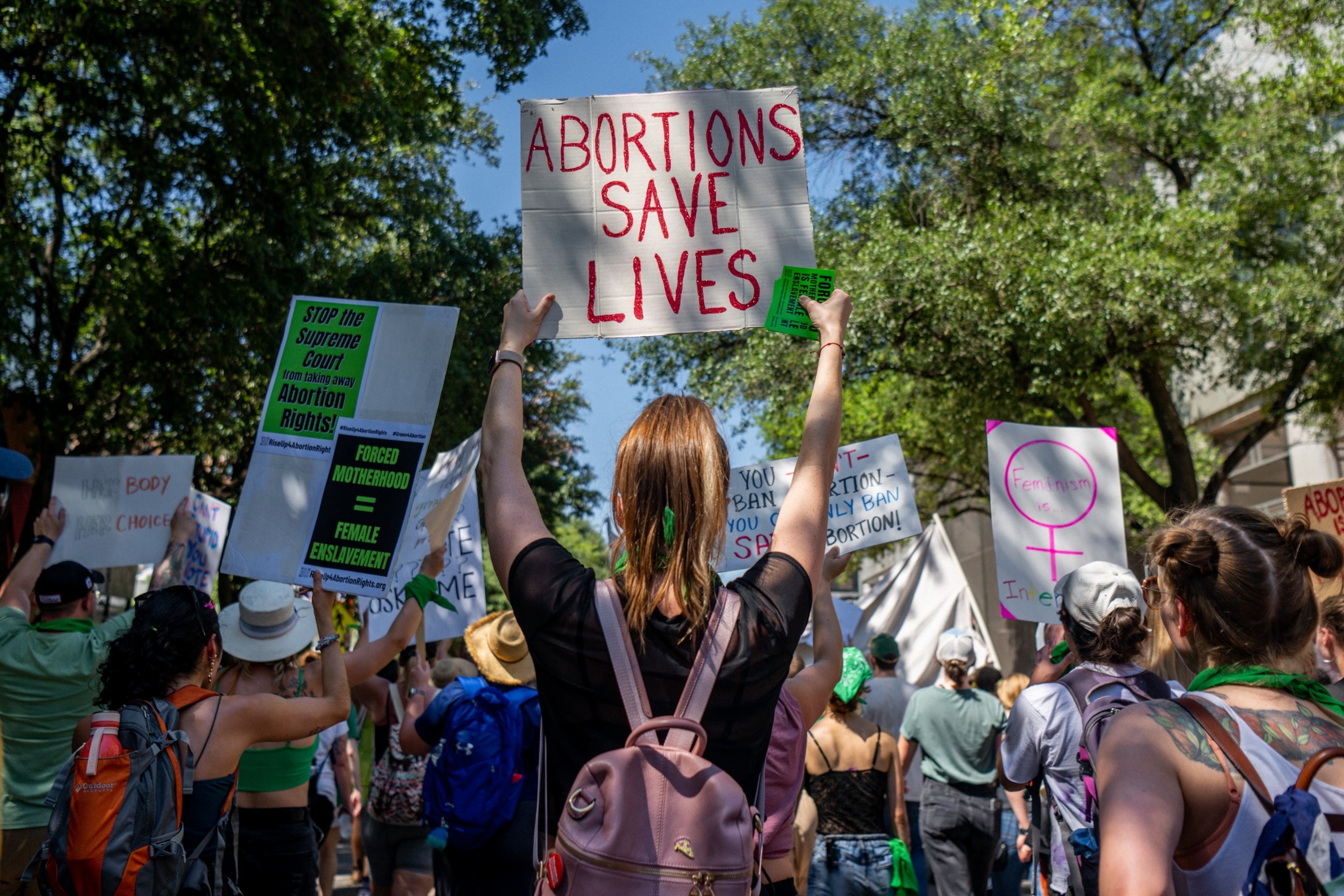 PHOTO: Abortion rights activists march outside of the Austin Convention Center in Austin, TX, May 14, 2022.