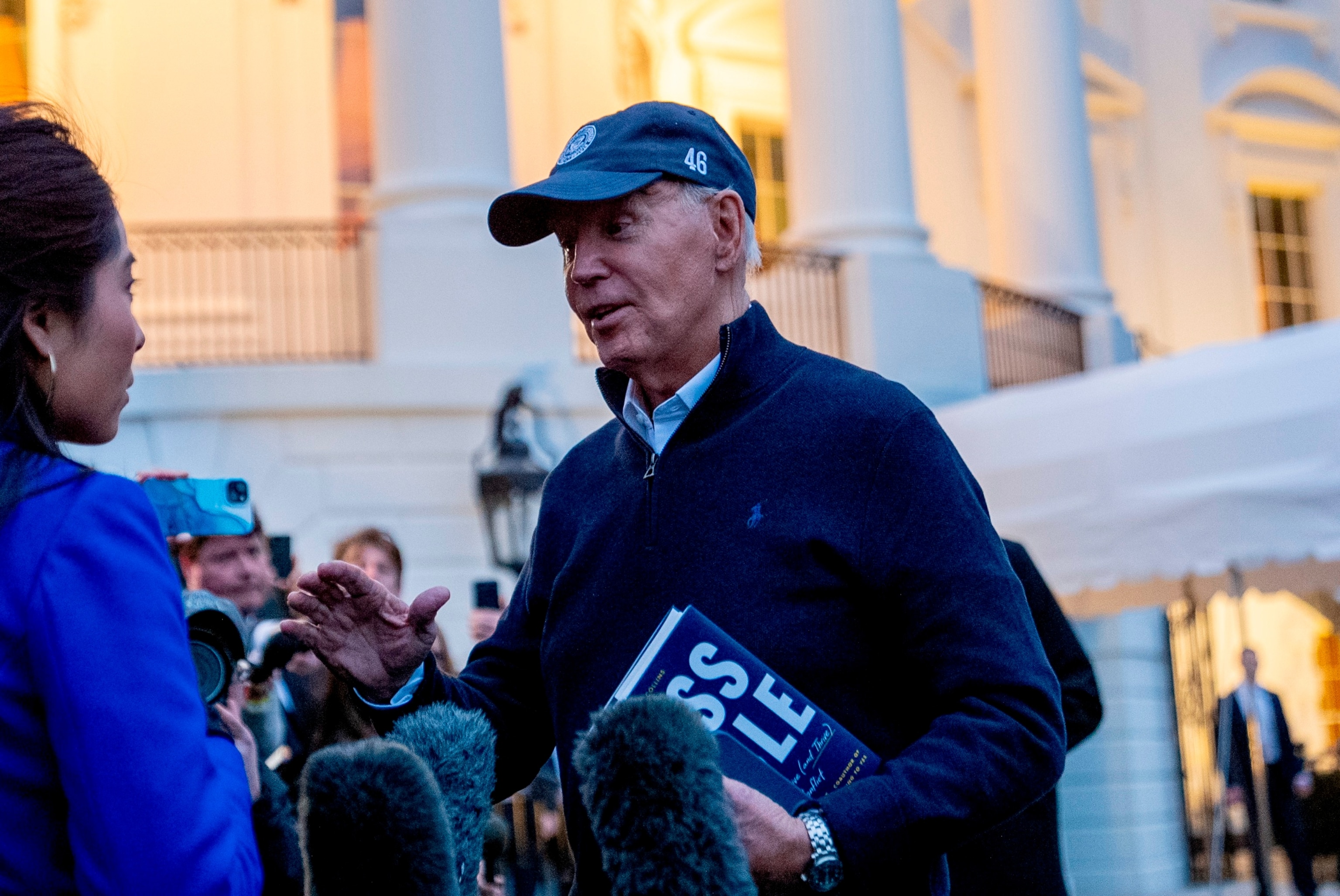 PHOTO: President Joe Biden speaks to members of the media before boarding Marine One on the South Lawn of the White House in Washington, Friday, March 1, 2024, to travel to Camp David, Md., for the weekend.