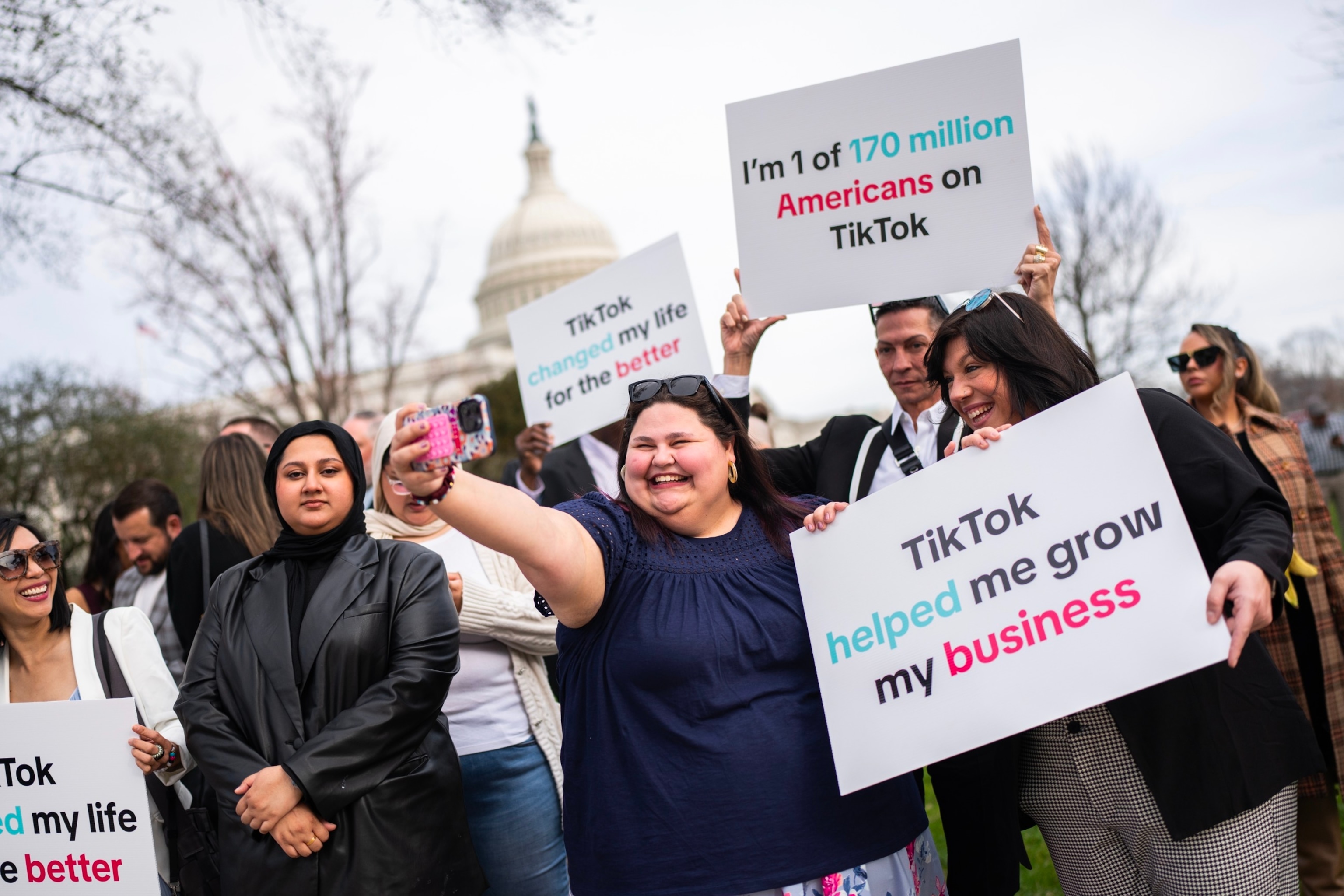 PHOTO: Tik Tok supporters are seen outside the U.S. Capitol, March 13, 2024, in Washington.      
