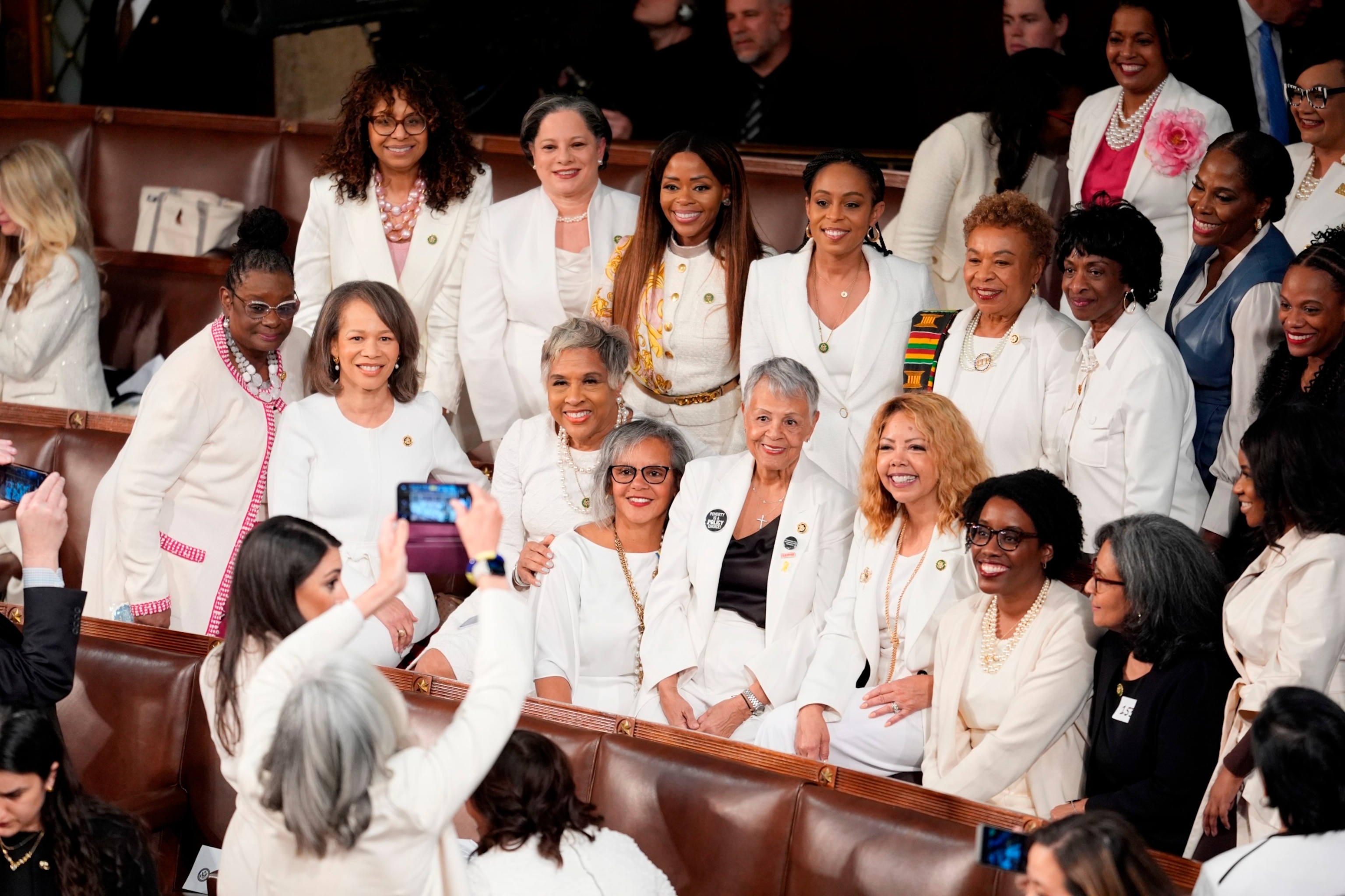 PHOTO: Women members of the House of Representatives, pose for photos before President Joe Biden arrives to deliver his State of the Union address to a joint session of Congress, at the Capitol in Washington, Mar. 7, 2024. 