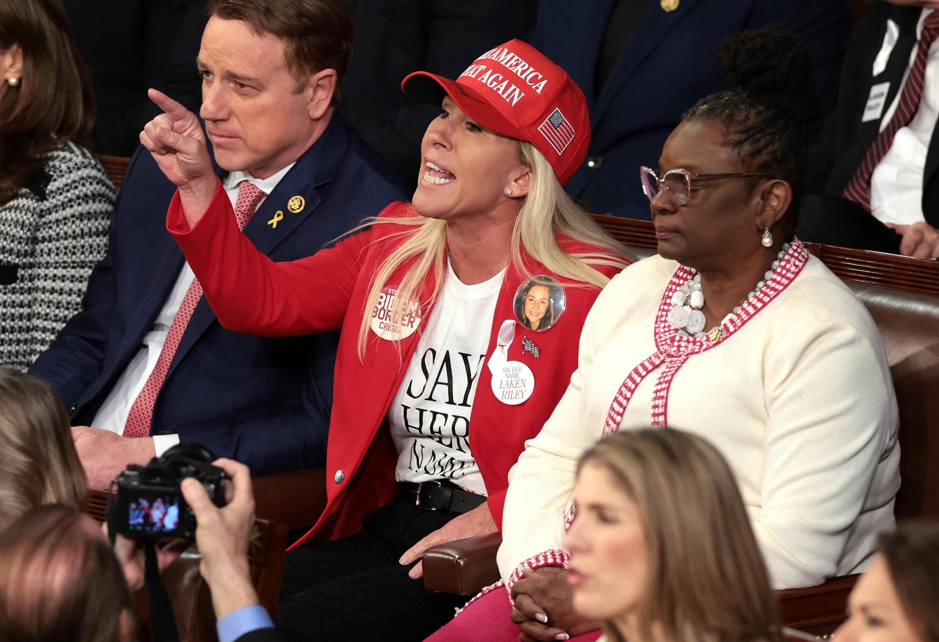 PHOTO: Rep. Marjorie Taylor Greene calls out as President Joe Biden delivers the State of the Union address during a joint meeting of Congress in the House chamber at the U.S. Capitol, on March 7, 2024, in Washington, D.C. 