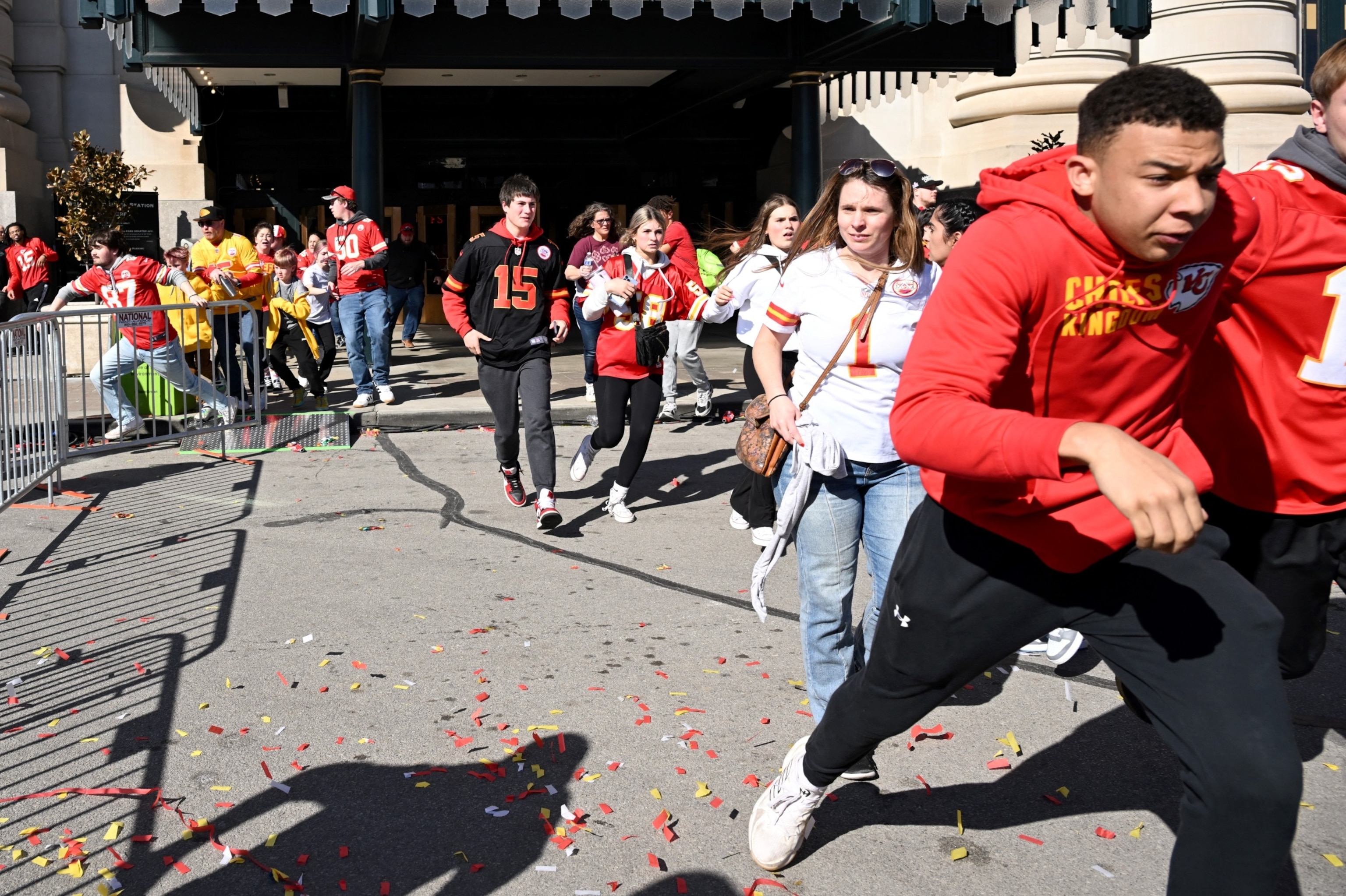 PHOTO: People flee after shots were fired near the Kansas City Chiefs' Super Bowl LVIII victory parade on February 14, 2024, in Kansas City, Missouri.