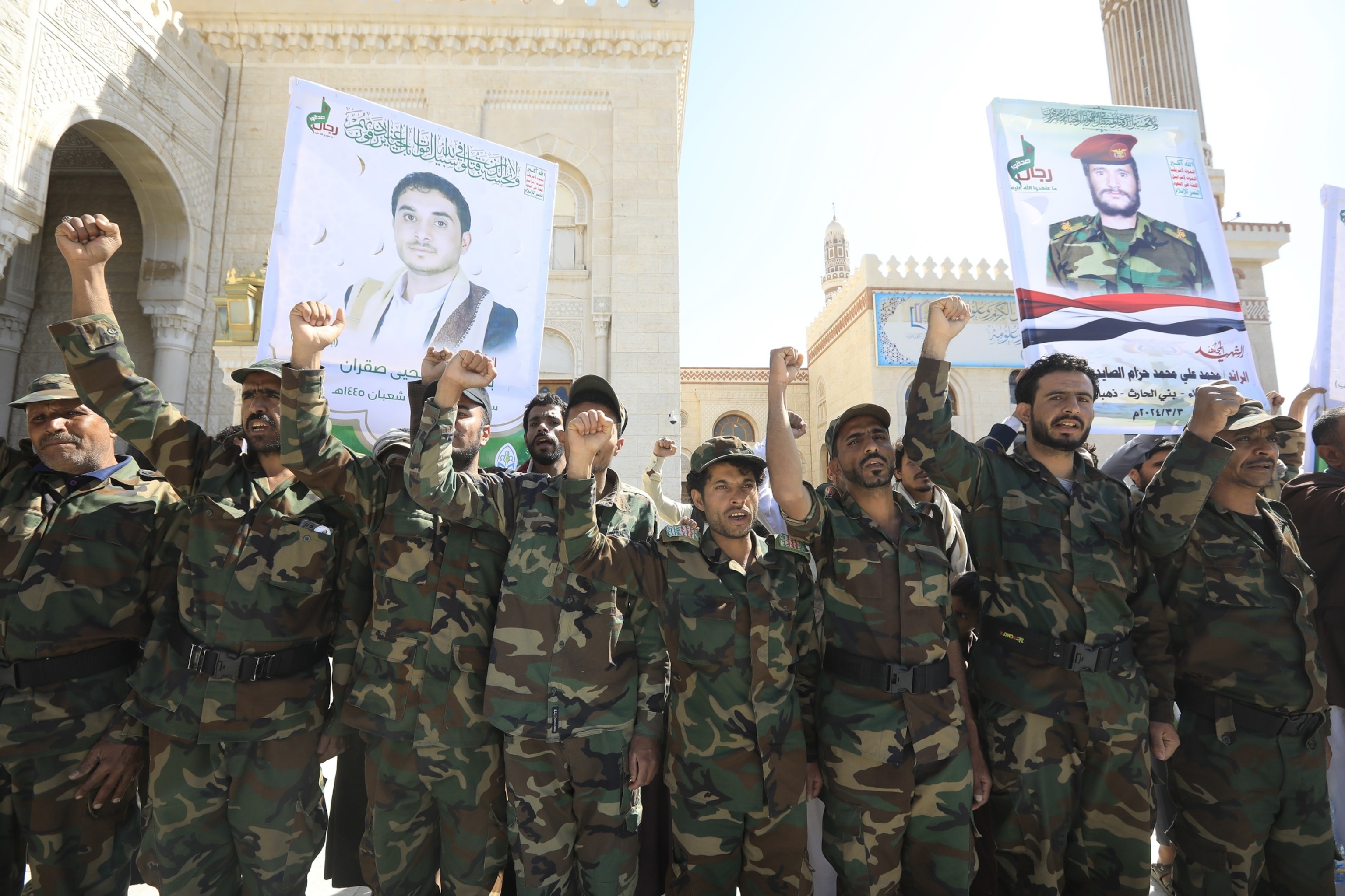 PHOTO: Houthi fighters shout slogans while attending a funeral for comrades at a mosque in Sana'a, Yemen, on March 5, 2024. 