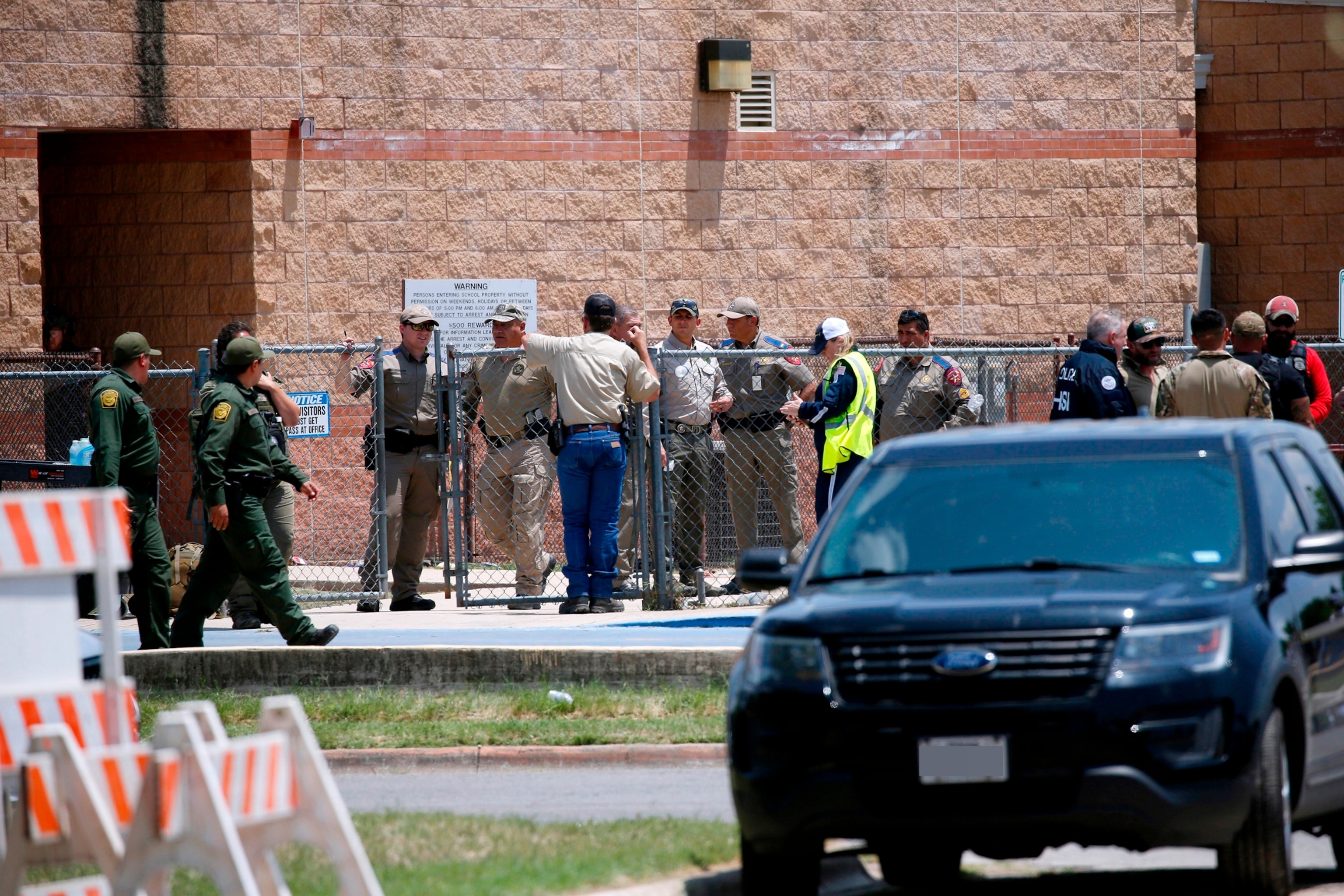 PHOTO: In this May 24, 2022, file photo, law enforcement, and other first responders, gather outside Robb Elementary School following a shooting in Uvalde, Texas.