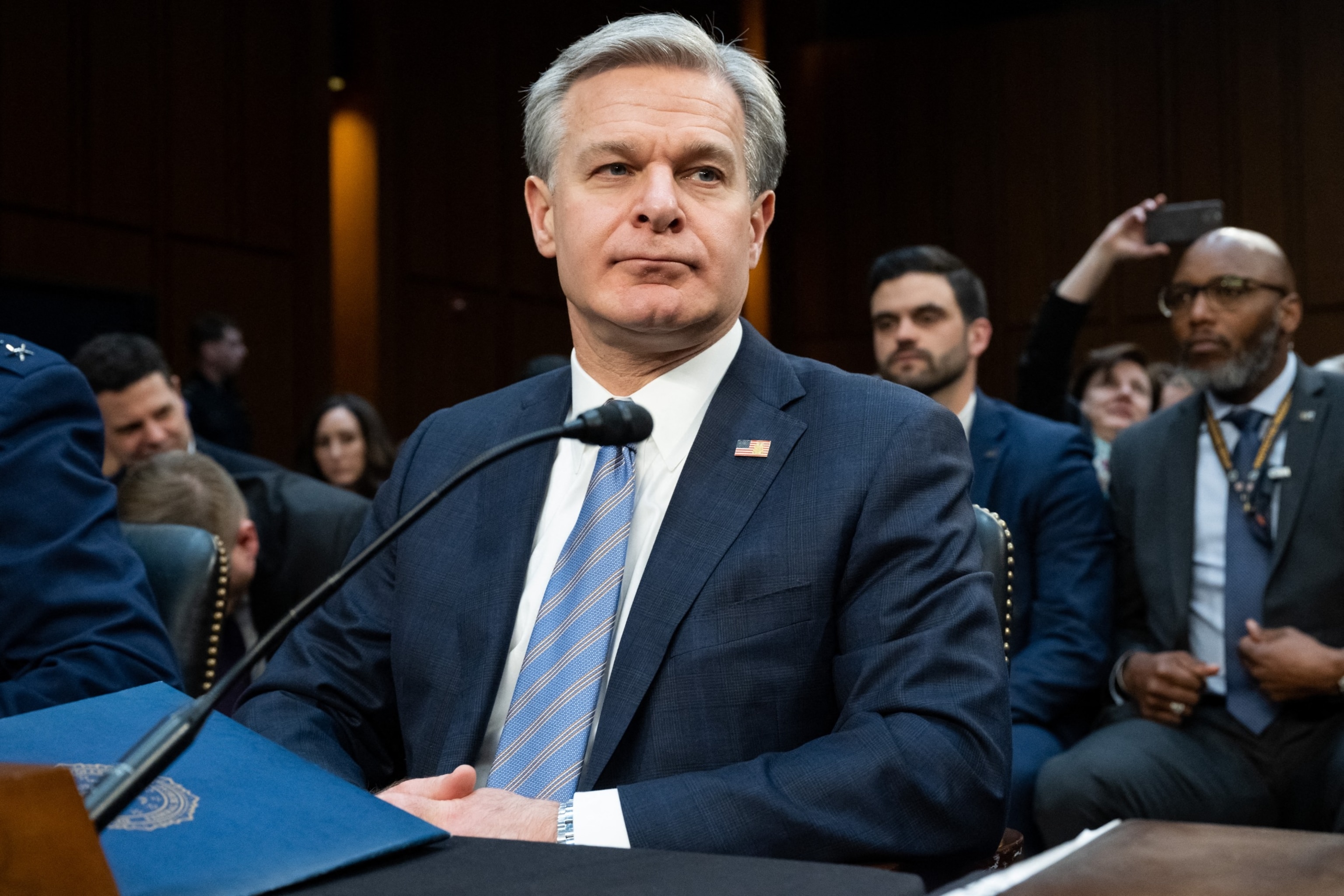 PHOTO: FBI Director Christopher Wray testifying during a Senate Select Committee on Intelligence on the "Annual Worldwide Threats Assessment" in the Hart Senate Office Building on Capitol Hill in Washington, Mar. 11, 2024.