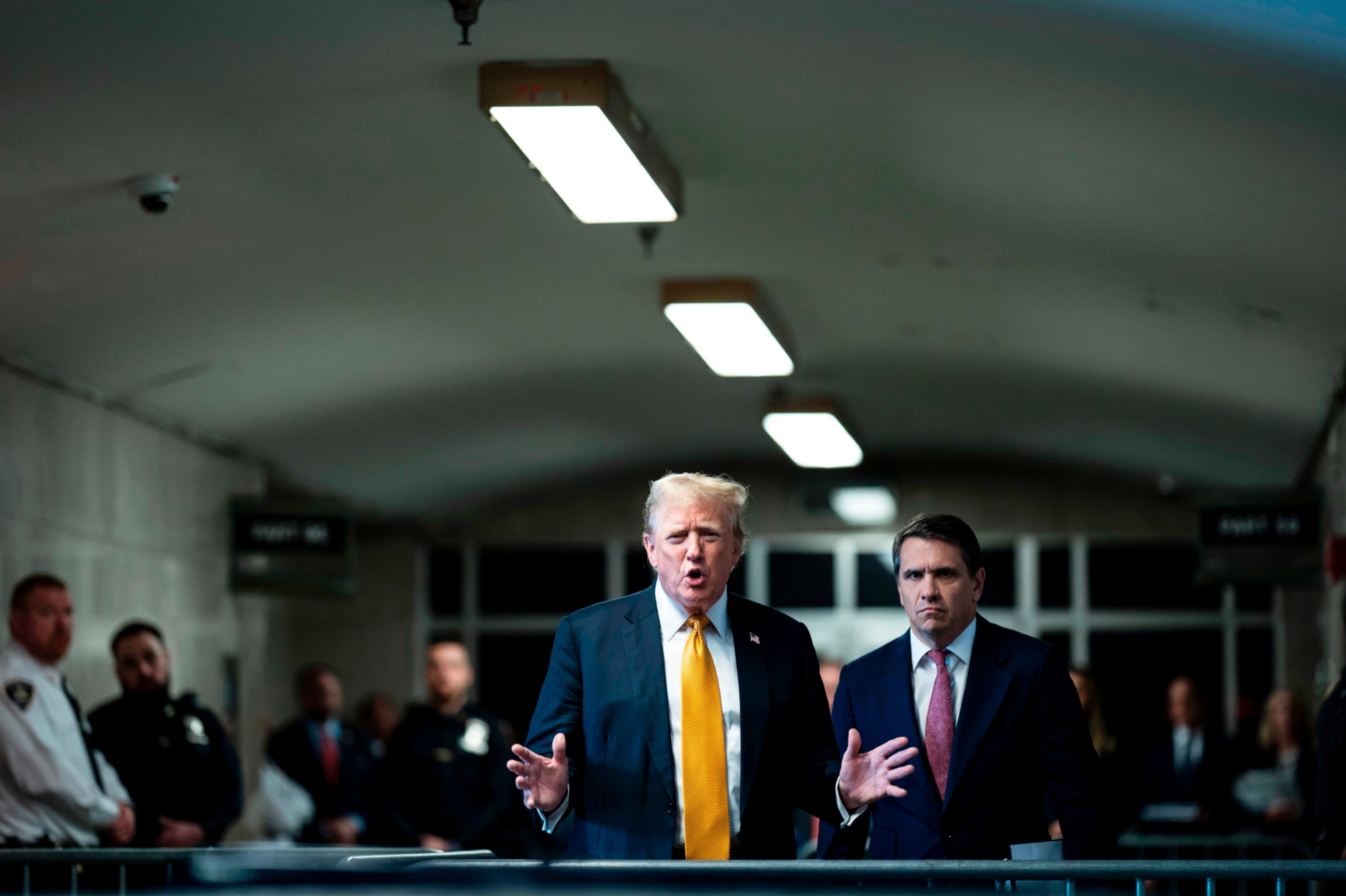 PHOTO: Former President Donald Trump speaks to reporters, with his attorney, Todd Blanche, right, as jurors begin deliberations for his trial at the Manhattan criminal court, May 29, 2024, in New York.