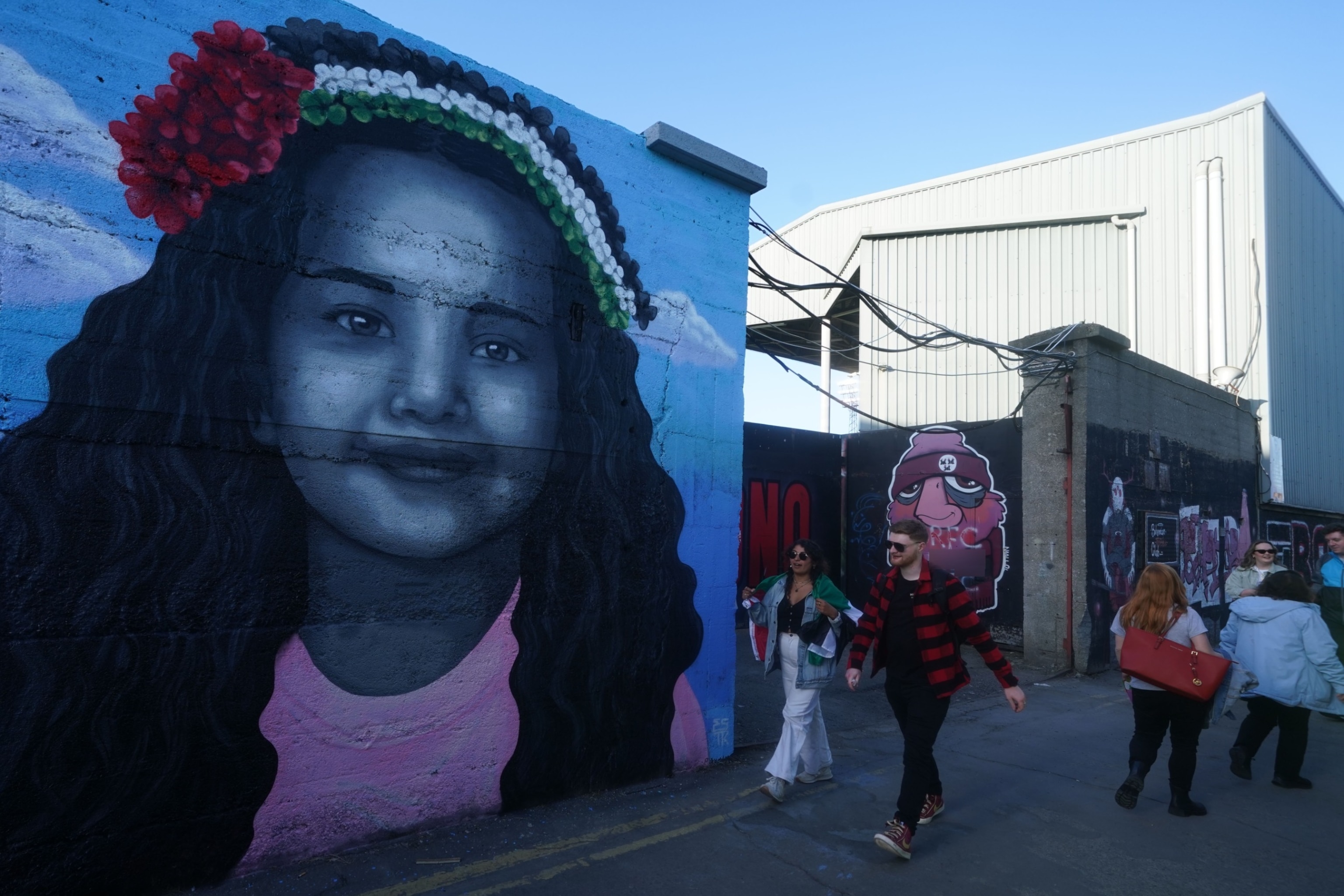 PHOTO: A mural of Hind Rajab, the 6-year-old Palestinian girl who was killed in Gaza, along with several family members and paramedics, by artist Emmalene Blake in Dublin, May 15, 2024. 