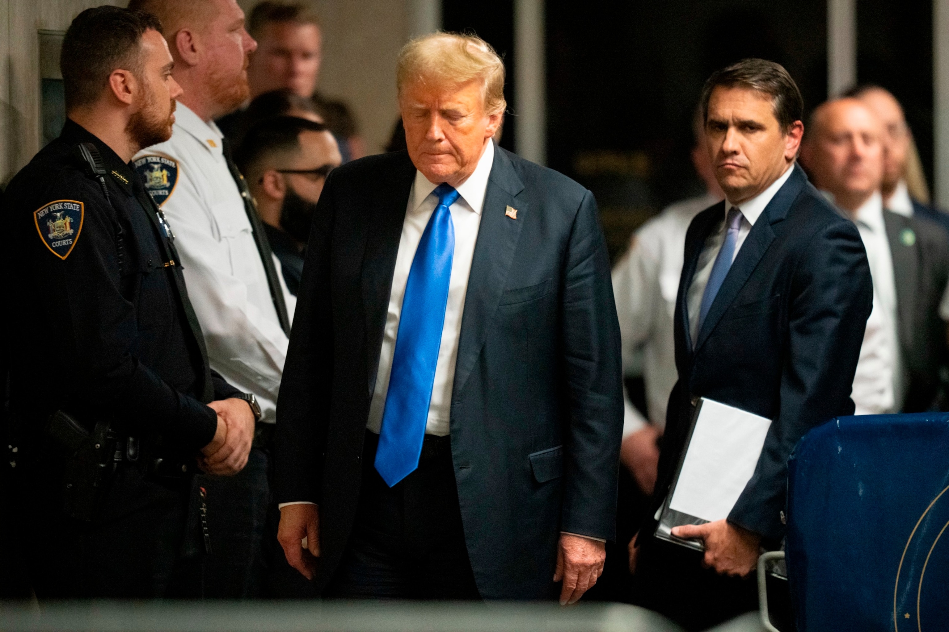 PHOTO: Former President Donald Trump walks to go speak to the media after being found guilty following his hush money trial at Manhattan Criminal Court, May 30, 2024, in New York .