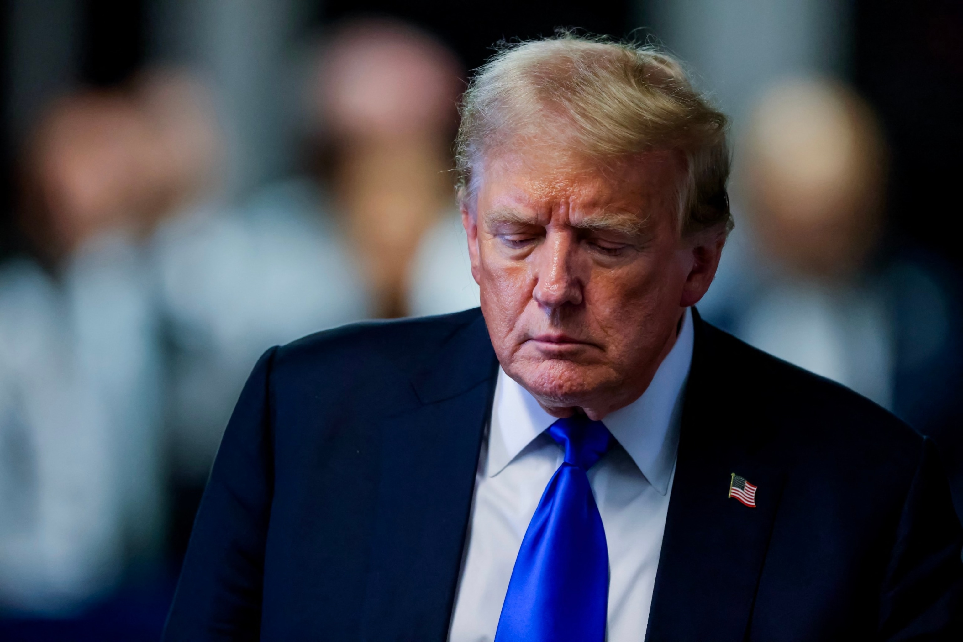 PHOTO: Former President and Republican presidential candidate Donald Trump exits the courtroom after he was convicted in his criminal trial at Manhattan Criminal Court in New York, May 30, 2024. 