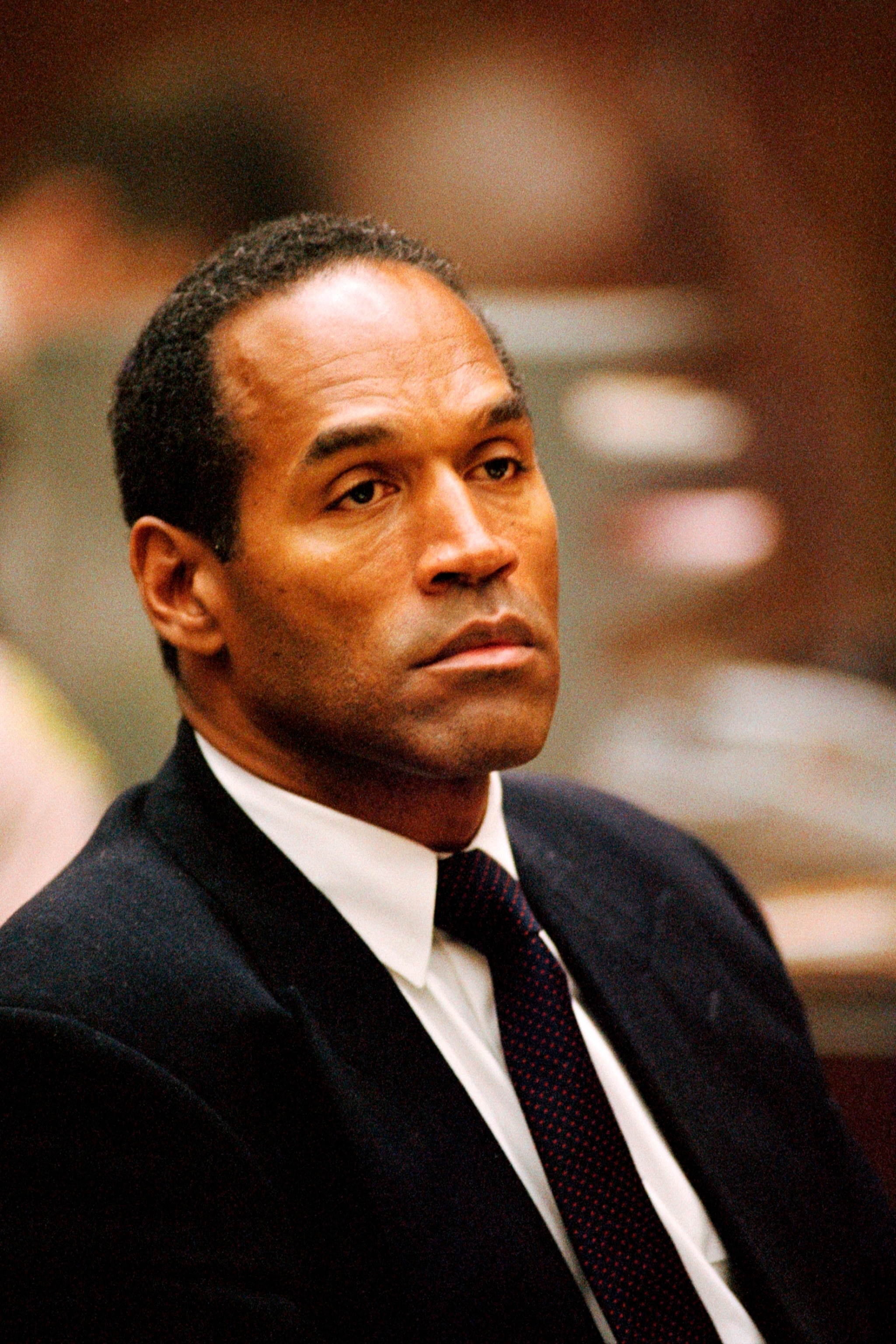 PHOTO: American former football player and actor O.J. Simpson during his trial for the murder of his wife Nicole Brown and her friend Ronald Goldman on June 12, 1994.