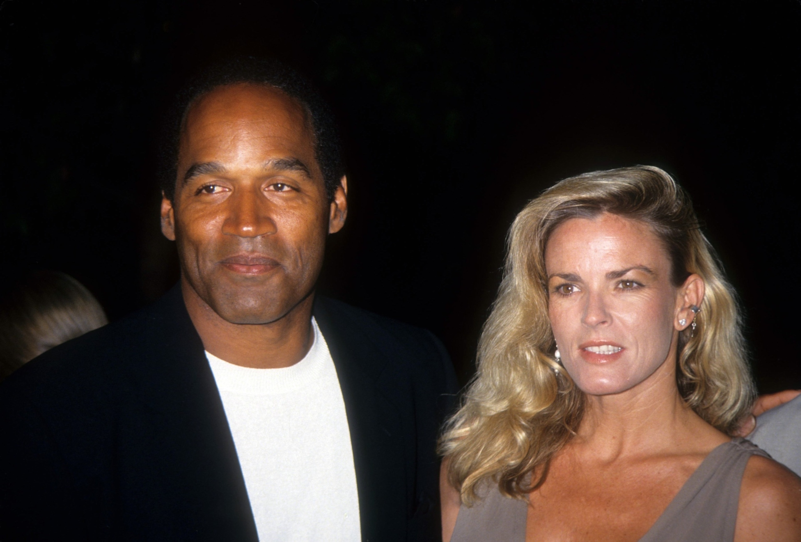 PHOTO: O.J. Simpson and Nicole Brown Simpson pose at the premiere of the "Naked Gun 33 1/3: The Final Isult" in which O.J. starred on March 16, 1994 in Los Angeles, California.