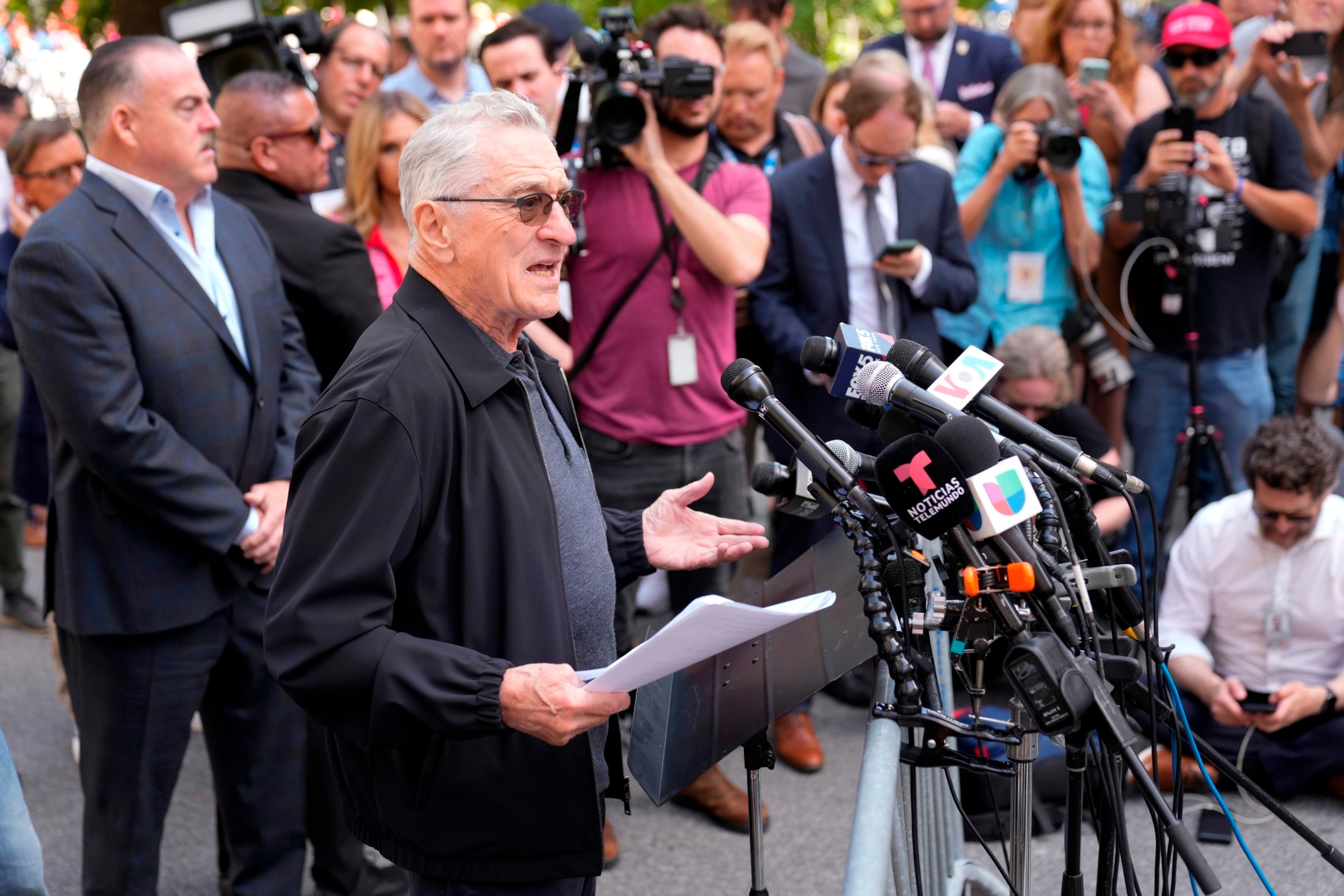 PHOTO: Robert De Niro speaks to reporters in support of President Joe Biden across the street from former President Donald Trump's criminal trial in New York, May 28, 2024. 