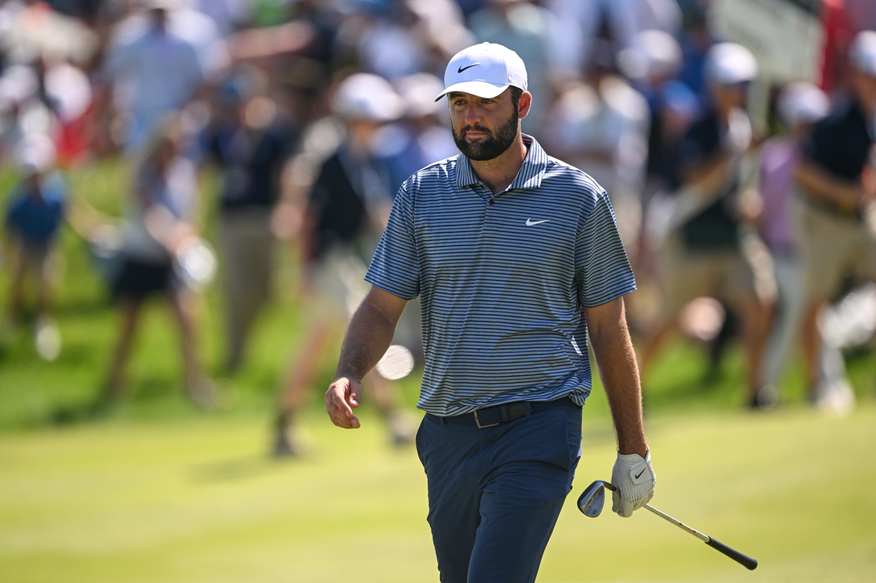 PHOTO: Scottie Scheffler walks the 18th fairway during the final round of the 2024 PGA Championship at Valhalla Golf Club on May 19, 2024 in Louisville, Ky.