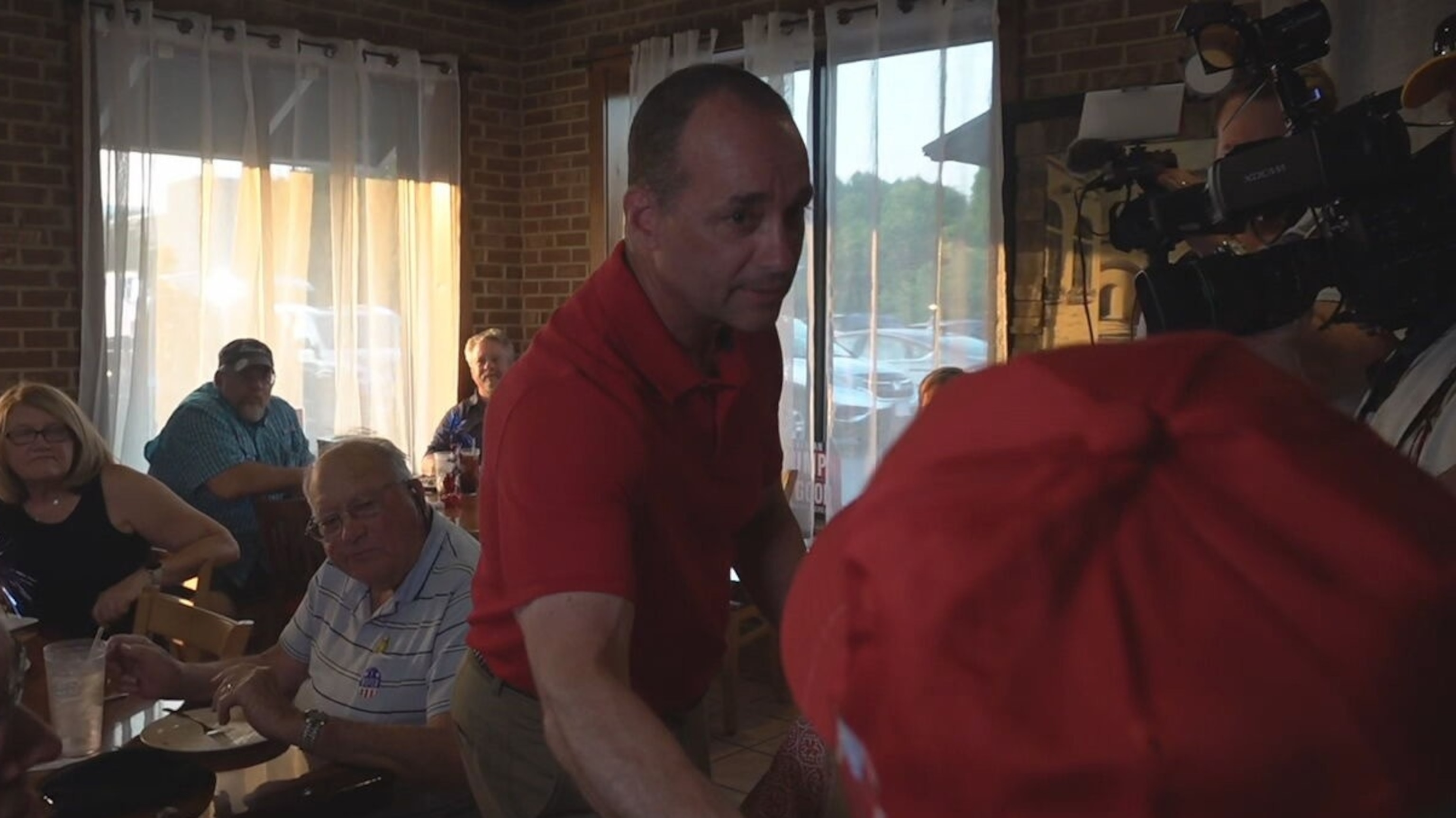 PHOTO: Rep. Bob Good, R-Va., meets with supporters at a primary night election party, June 18, 2024, in Lynchburg, Va.