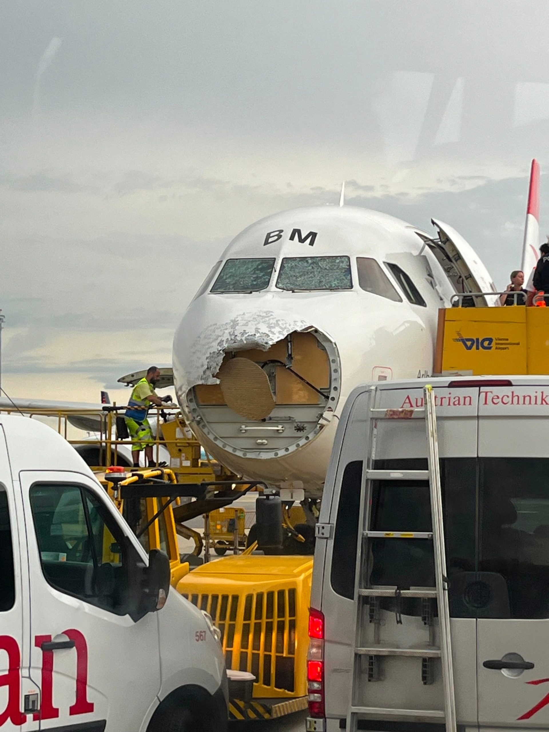 Austrian Airlines plane sustains significant damage to nose and cockpit windows from hailstorm