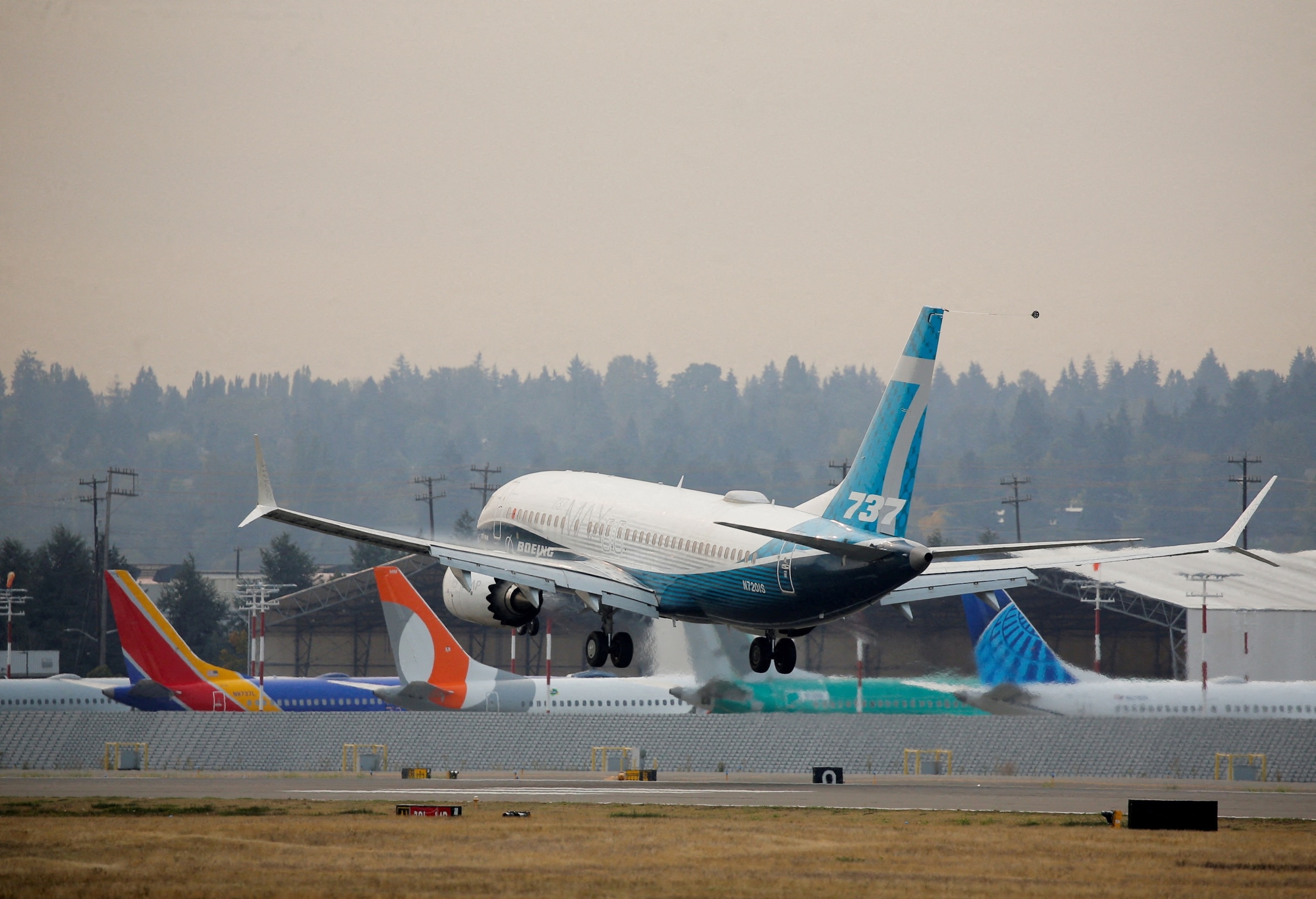 PHOTO: A Boeing 737 MAX 7 aircraft piloted by Federal Aviation Administration (FAA) Chief Steve Dickson lands during an evaluation flight at Boeing Field in Seattle, Washington, U.S. September 30, 2020. 