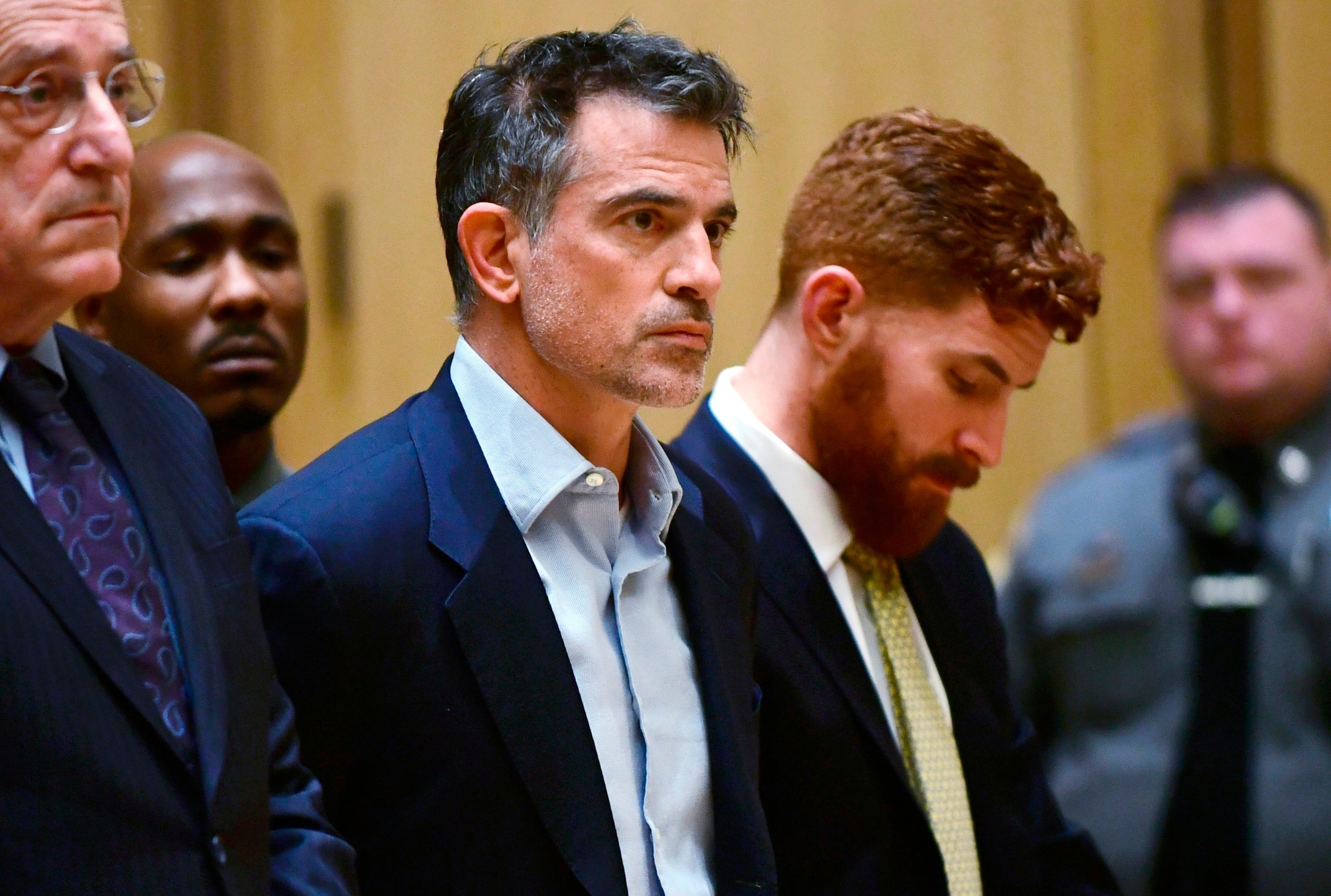 PHOTO: In this Jan. 8, 2020 file photo, Fotis Dulos, center, the estranged husband of missing mother of five, Jennifer Dulos, is arraigned on murder and kidnapping charges in Stamford Superior Court in Stamford, Conn.